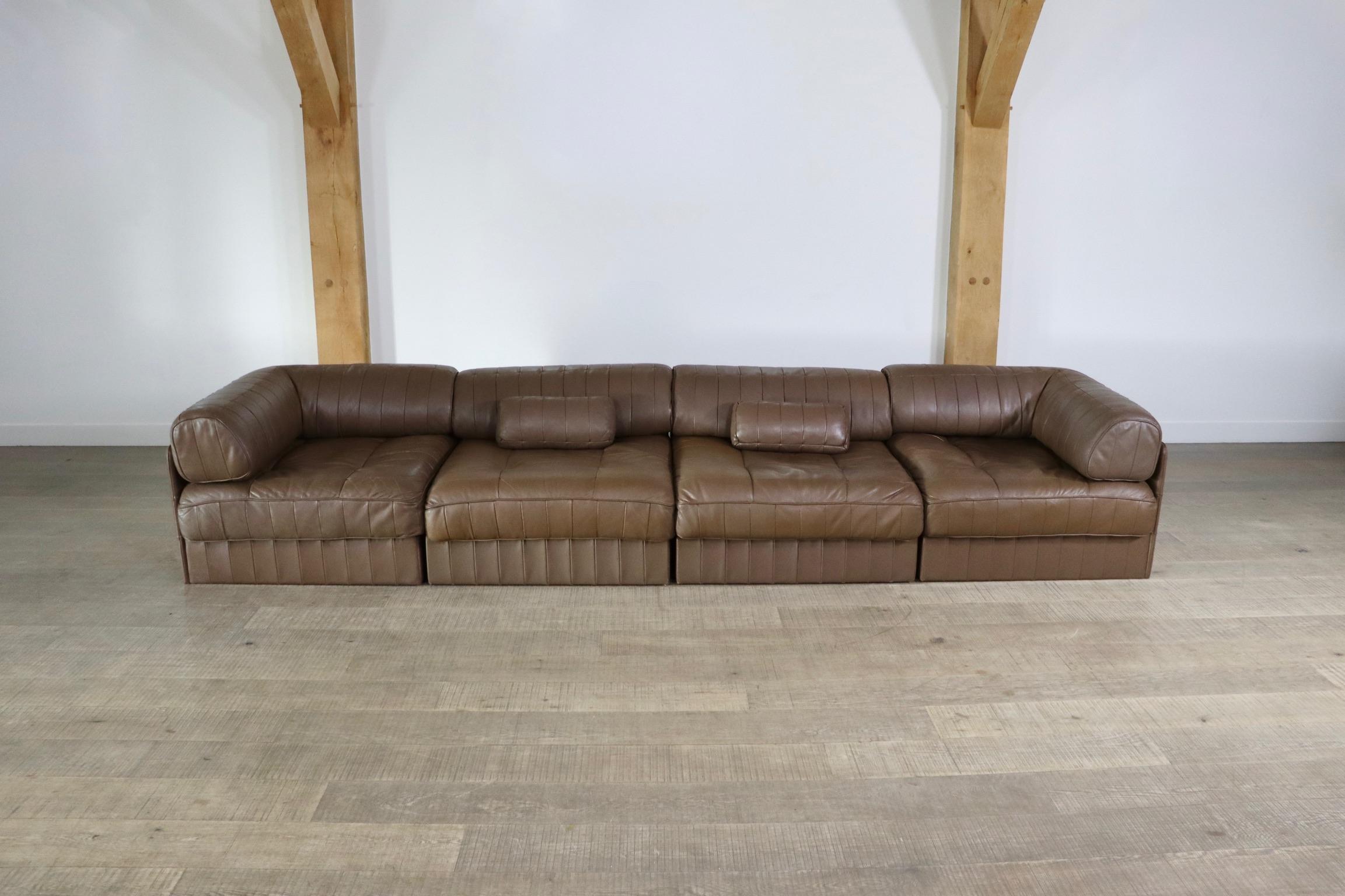 Beautiful DS-88 patchwork leather sofa designed and manufactured by De Sede, Switzerland 1970s. The sofa consists of 4 elements, each with a base leather patchwork cushion and back cushion made from the same soft luxurious leather. The sofa has