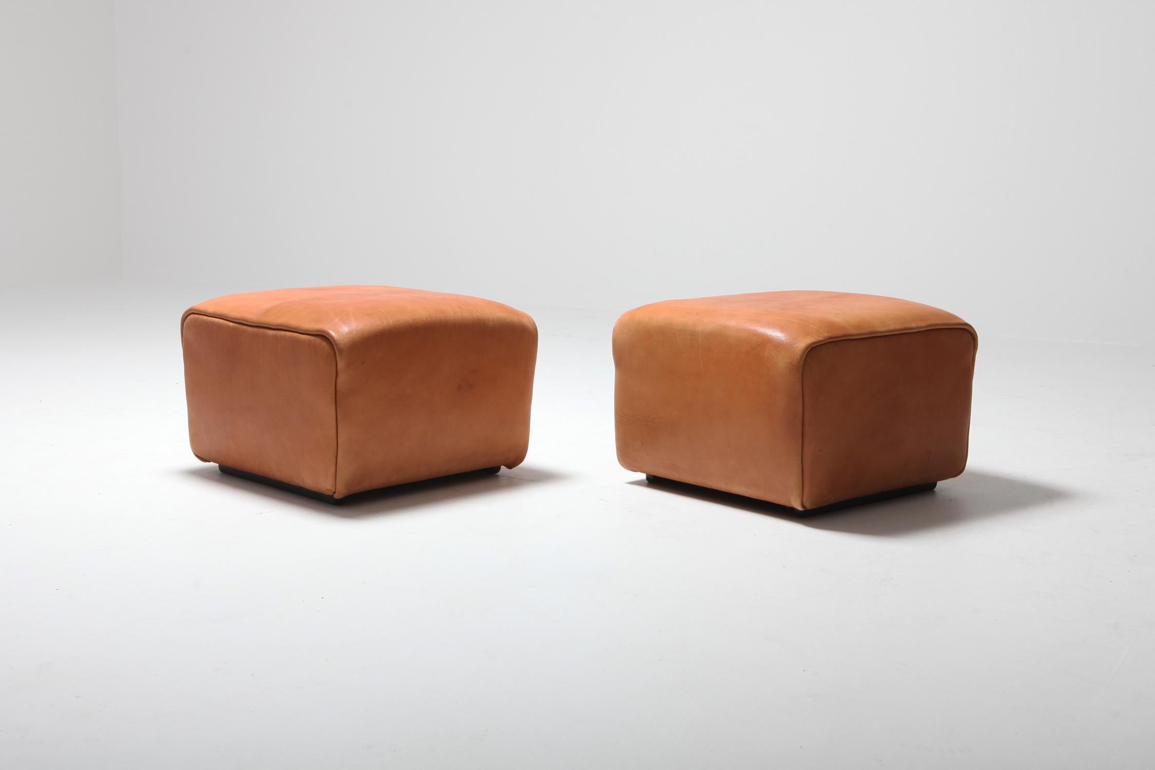 Cognac leather ottomans by Swiss manufacturer De Sede.

The DS models are true design classics and are still in production. These are original ottomans with tons of character and a great patina you only get with age.


 