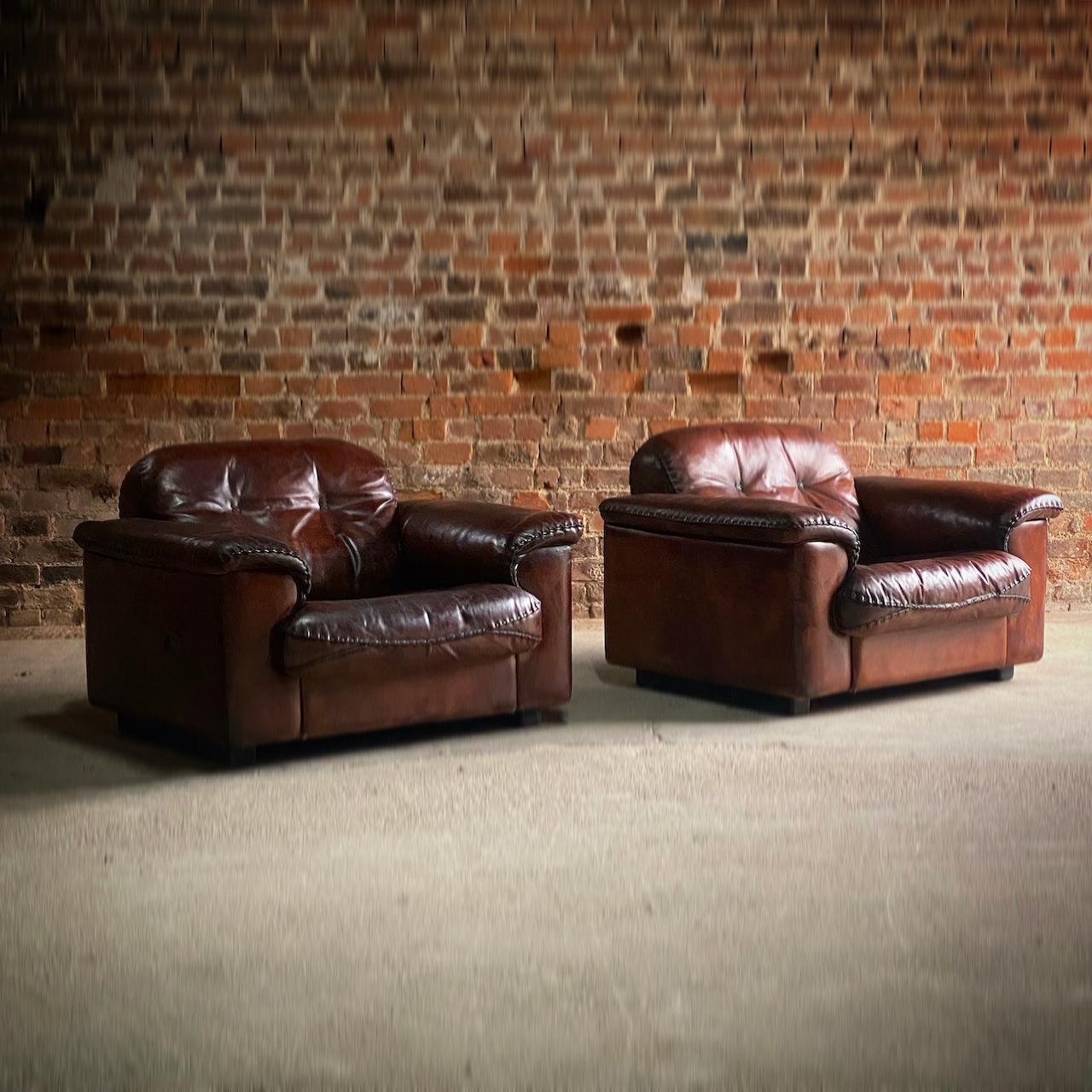 De Sede DS101 armchairs lounge chairs leather pair1970 

Super fine mid-century De Sede DS 101 Lounge Armchairs Switzerland 1970, these lusciously oversized armchairs have extendable seats for extra comfort, upholstered in the finest thick Cuban