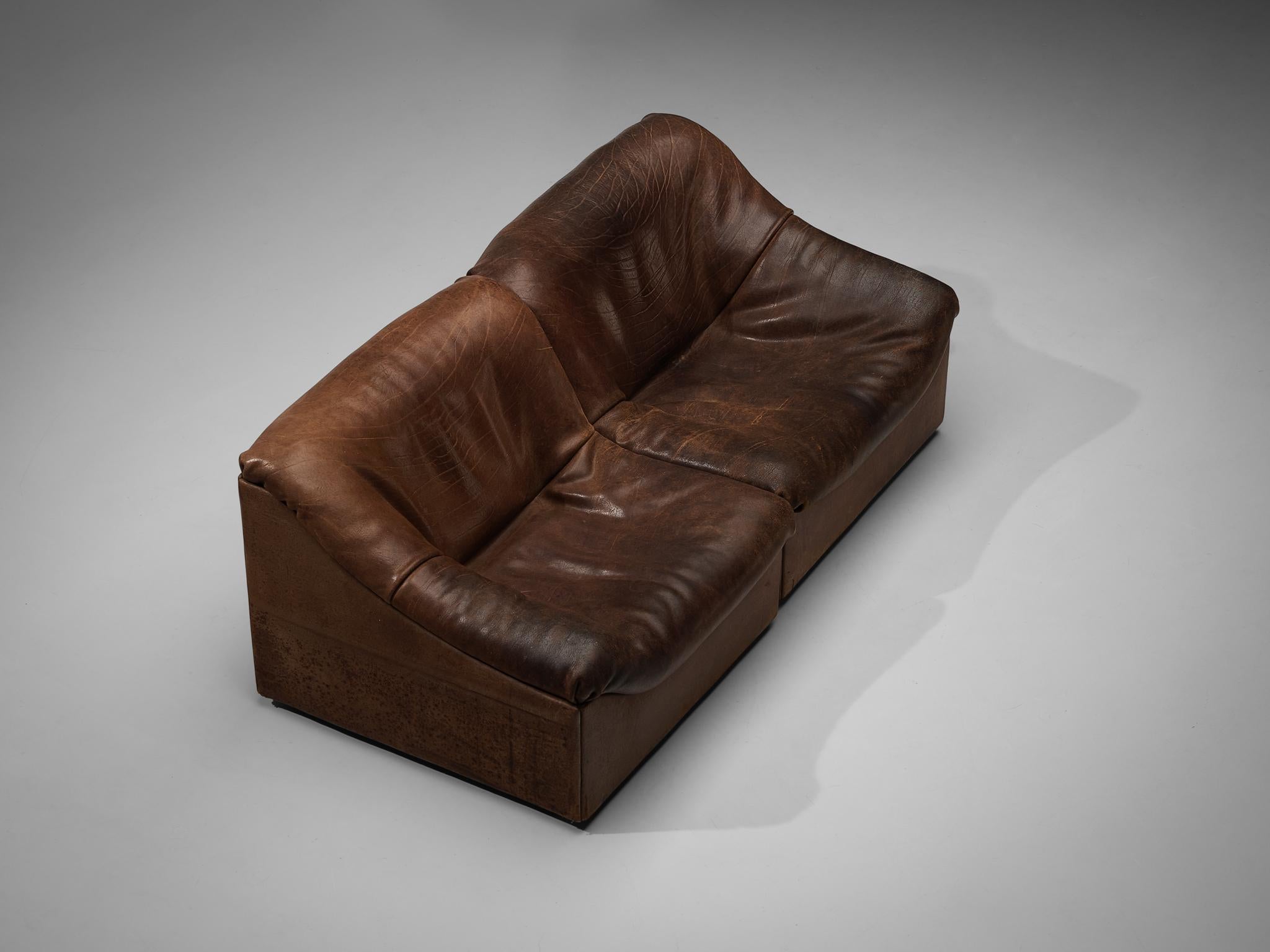 De Sede, sectional sofa or lounge chairs model 'DS-46', brown leather, Switzerland, 1970s

Comfortable sectional sofa or lounge chairs in thick buffalo leather by De Sede. This model features a solid base with a rounded, bulky seat and a high back.