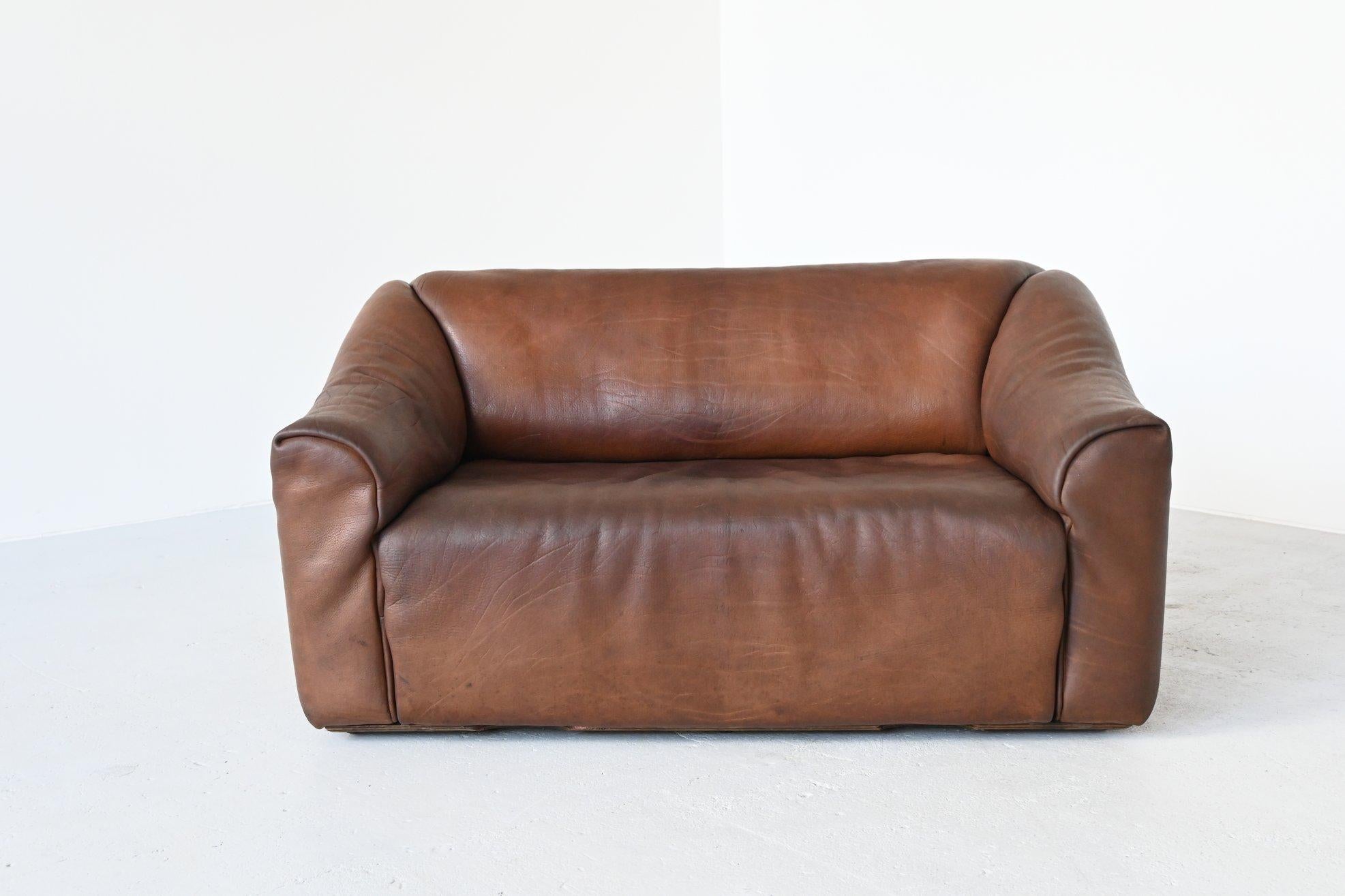 Very comfortable DS47 two-seat sofa designed and manufactured by De Sede, Switzerland 1970. The sofa is made of high quality brown buffalo leather. De Sede is known for its supreme quality leather and comfort seating. The sofa has the incredible