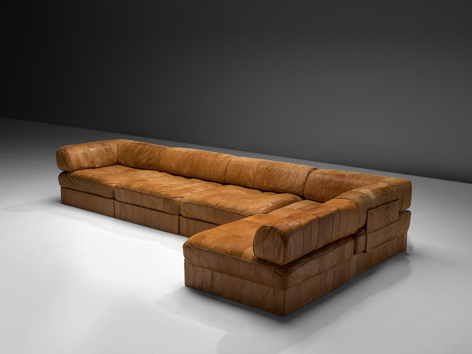 De Sede, sofa, DS 88, cognac patinated leather, Switzerland, 1970s. 

This comfortable leather sofa is manufactured by De Sede in Switzerland. Sectional sofa by the Swiss quality manufacturer De Sede. This sofa consists of five elements. The