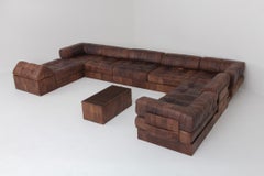 Canapé modulaire DS88 en cuir brun-cognac patchwork De Sede