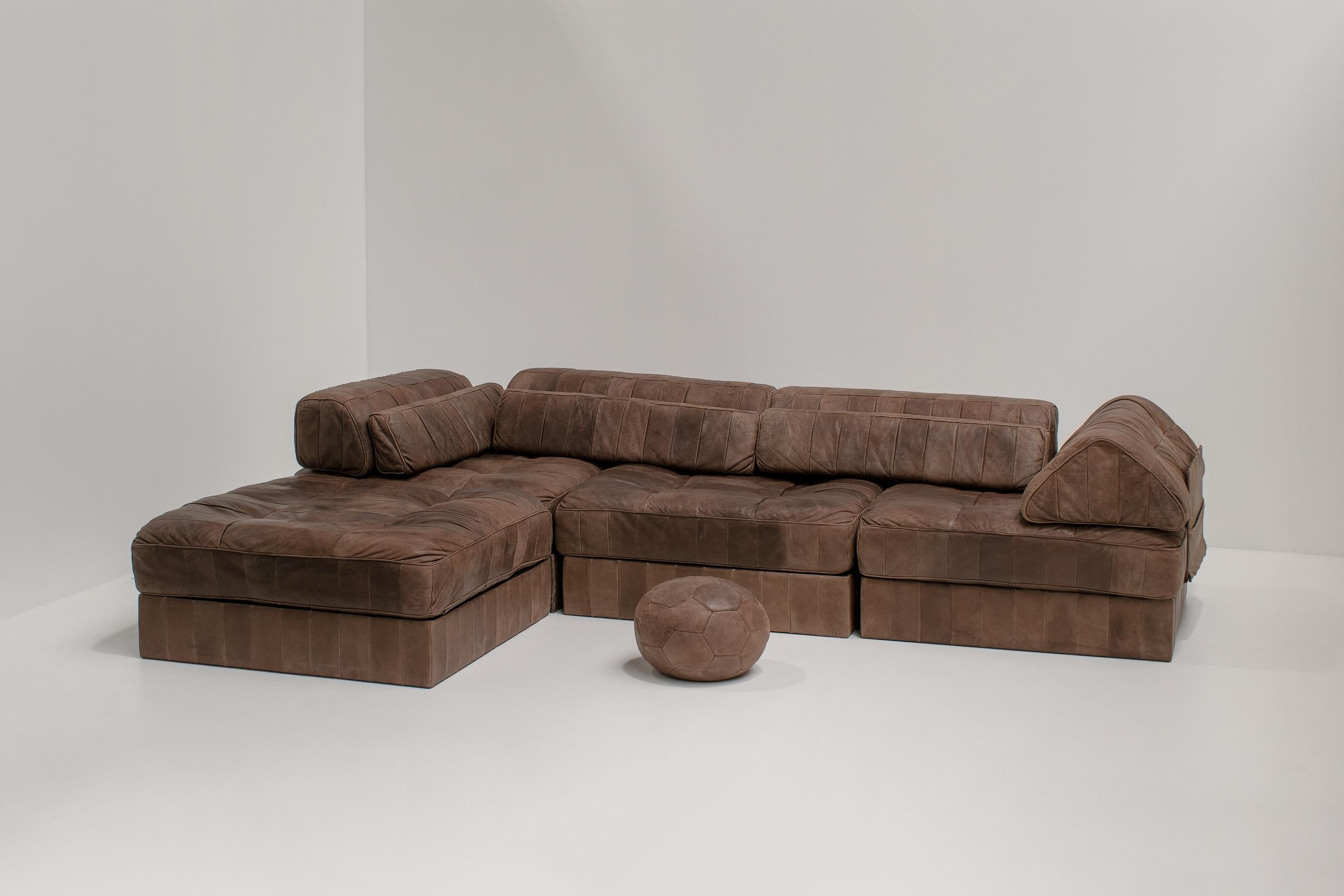 De Sede, 'DS-88' sectional sofa, leather, Switzerland, the 1970s. 

This is the ultimate 70s modular patchwork sofa. But, because of its straight lines, it still has a very modern feeling to it. 
What makes this sofa the perfect match for any