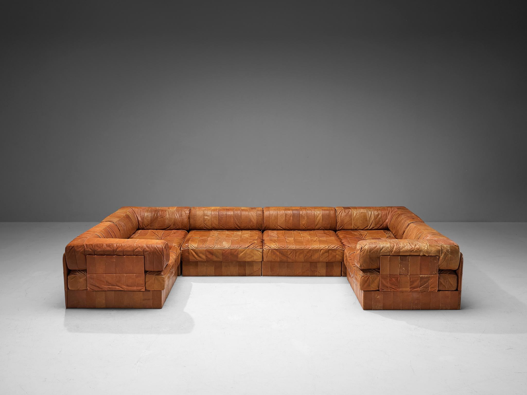 De Sede, sectional sofa, DS 88, cognac leather, 1970s. 

This comfortable leather sofa is manufactured by De Sede in Switzerland. This sofa consists of four corner elements and two regular elements. The cushions are upholstered with the original