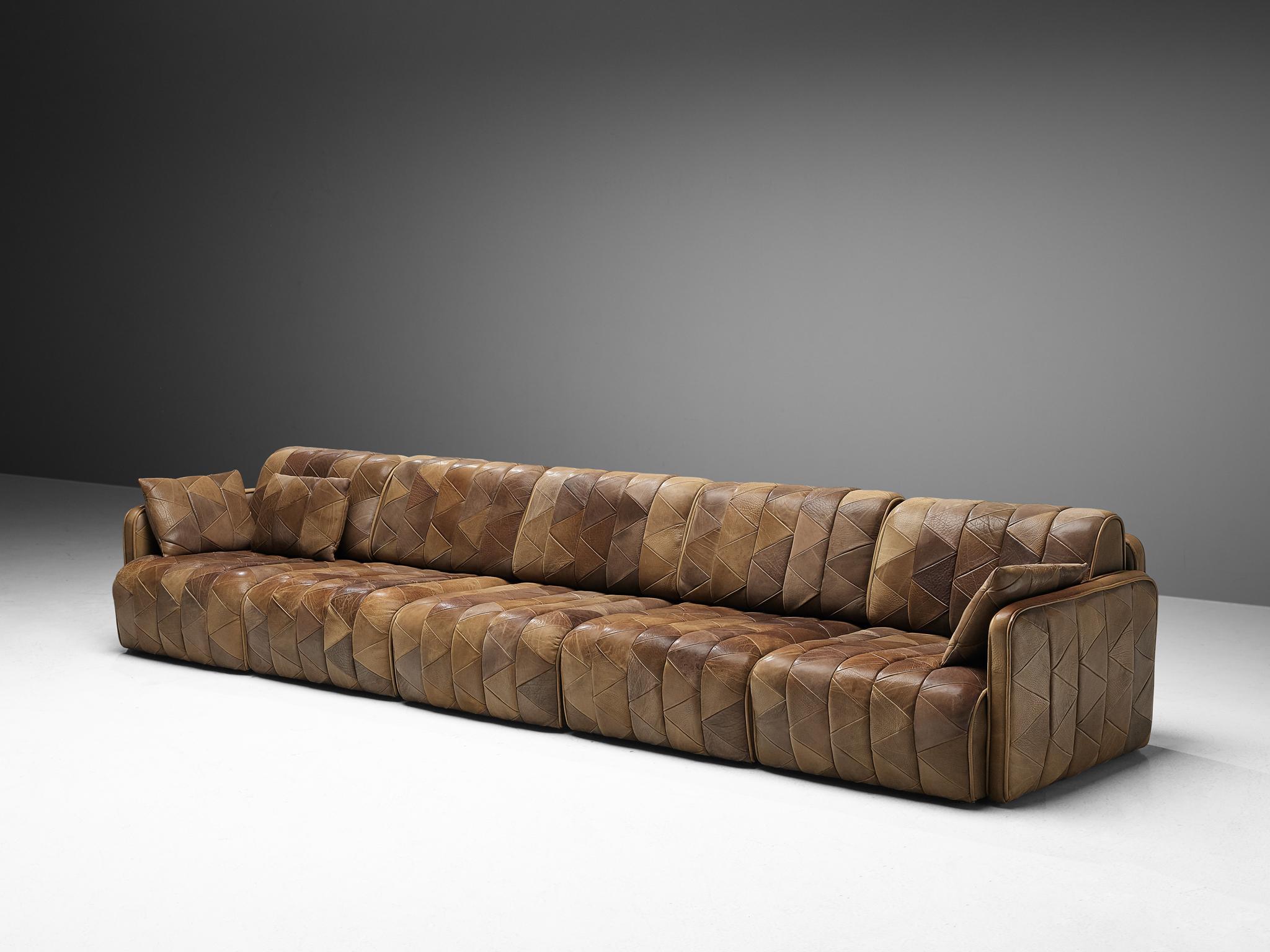 De Sede, sofa, brown patinated leather, 1970s.

This comfortable leather sofa is made by quality manufacturer De Sede in Switzerland. Known for its craftsmanship, highest quality leather, and unique aesthetics, De Sede manufactures furniture that