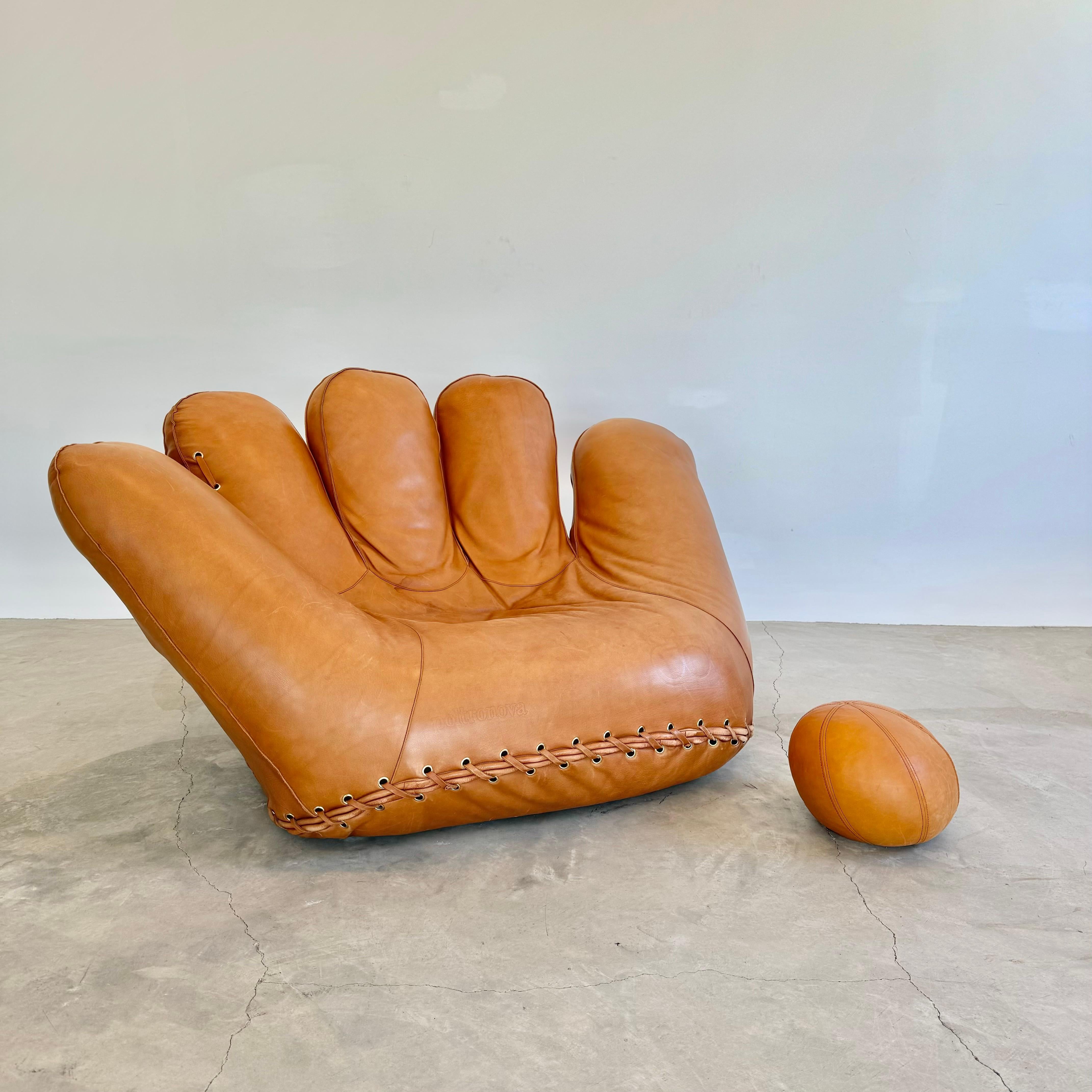 Iconic 'Joe' glove chair in a buttery soft tan leather was Designed by Jonathan De Pas, Donato D'Urbino and Paolo Lomazzi in the 1970's  and signed by all three designers. This chair, combining elegant Italian design with the game of Baseball was