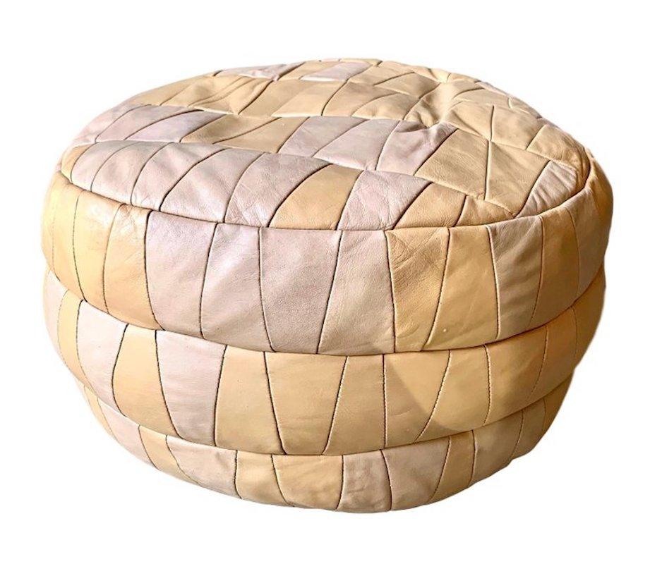 Massive collection of vintage leather poufs/ottomans by De Sede of Switzerland. Perfect for a living room, boutique hotel or retail store. Various color poufs, ottomans with storage and without. Good vintage condition. 


 