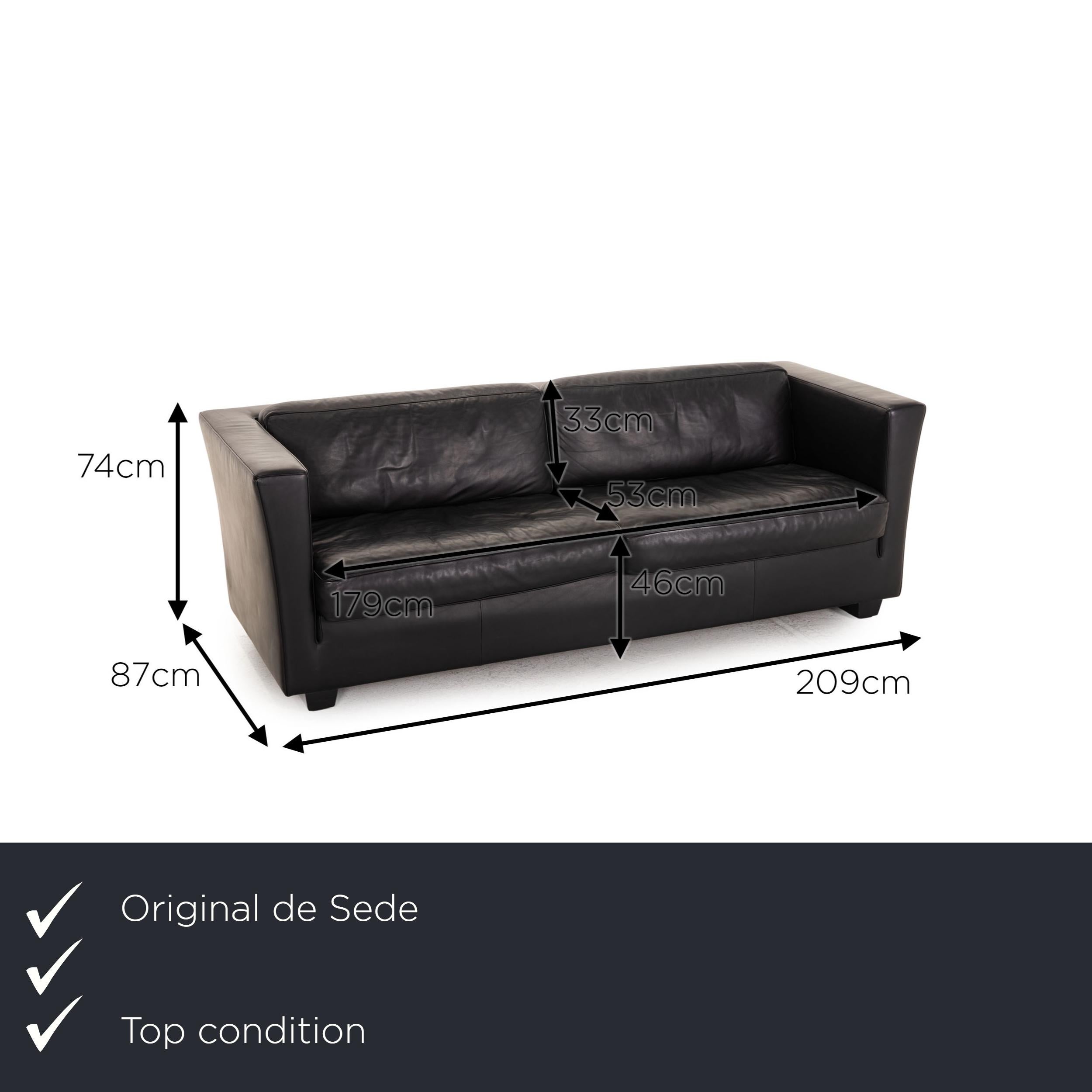 We present to you a de Sede lotus leather sofa black two-seater couch.

Product measurements in centimeters:

Depth: 87
Width: 209
Height: 74
Seat height: 46
Rest height: 74
Seat depth: 53
Seat width: 179
Back height: 33.

     