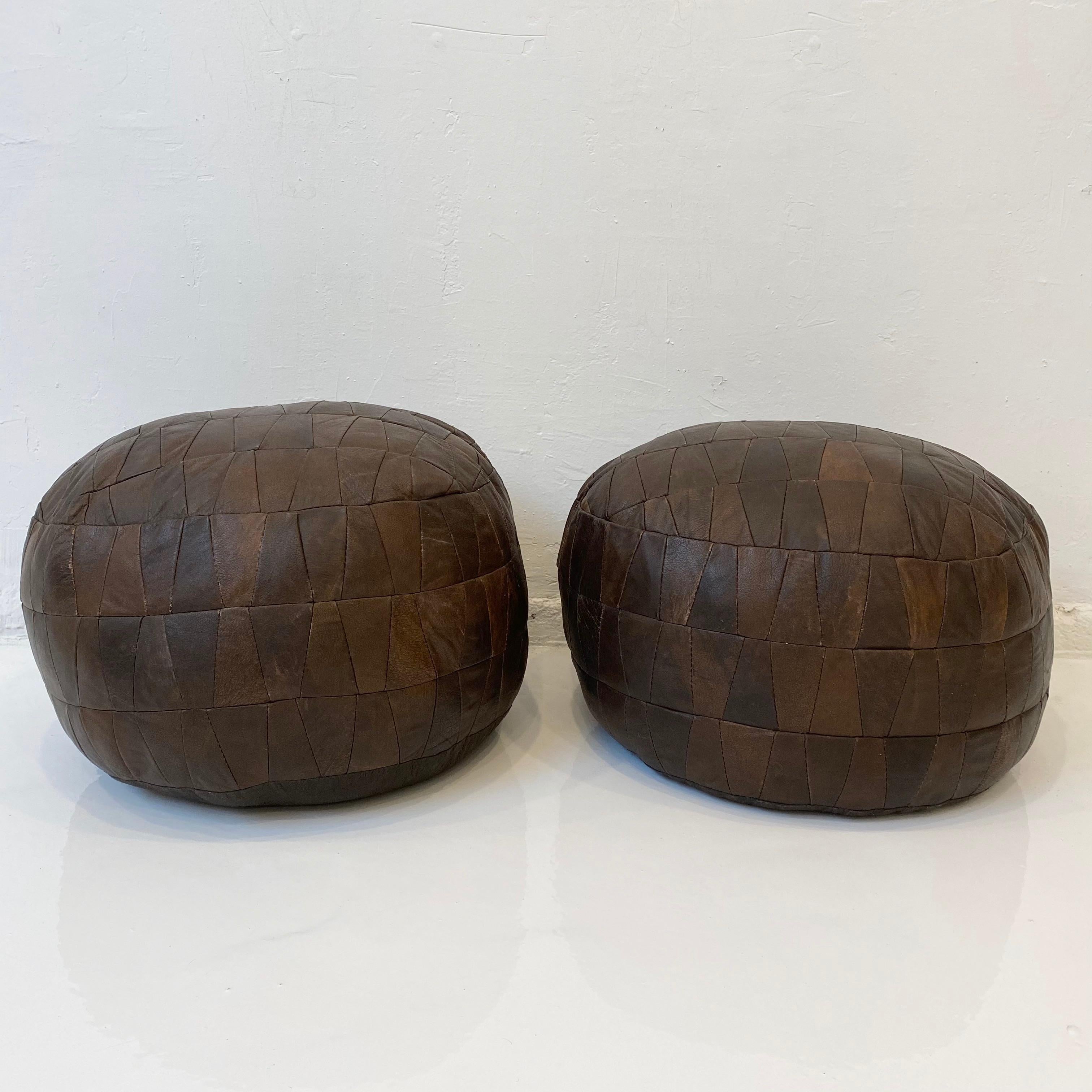 Gorgeous brown leather pouf by Swiss designer De Sede with triangular patchwork. Perfect accent piece. Good vintage condition. 

Matching pair available. Priced individually.
  