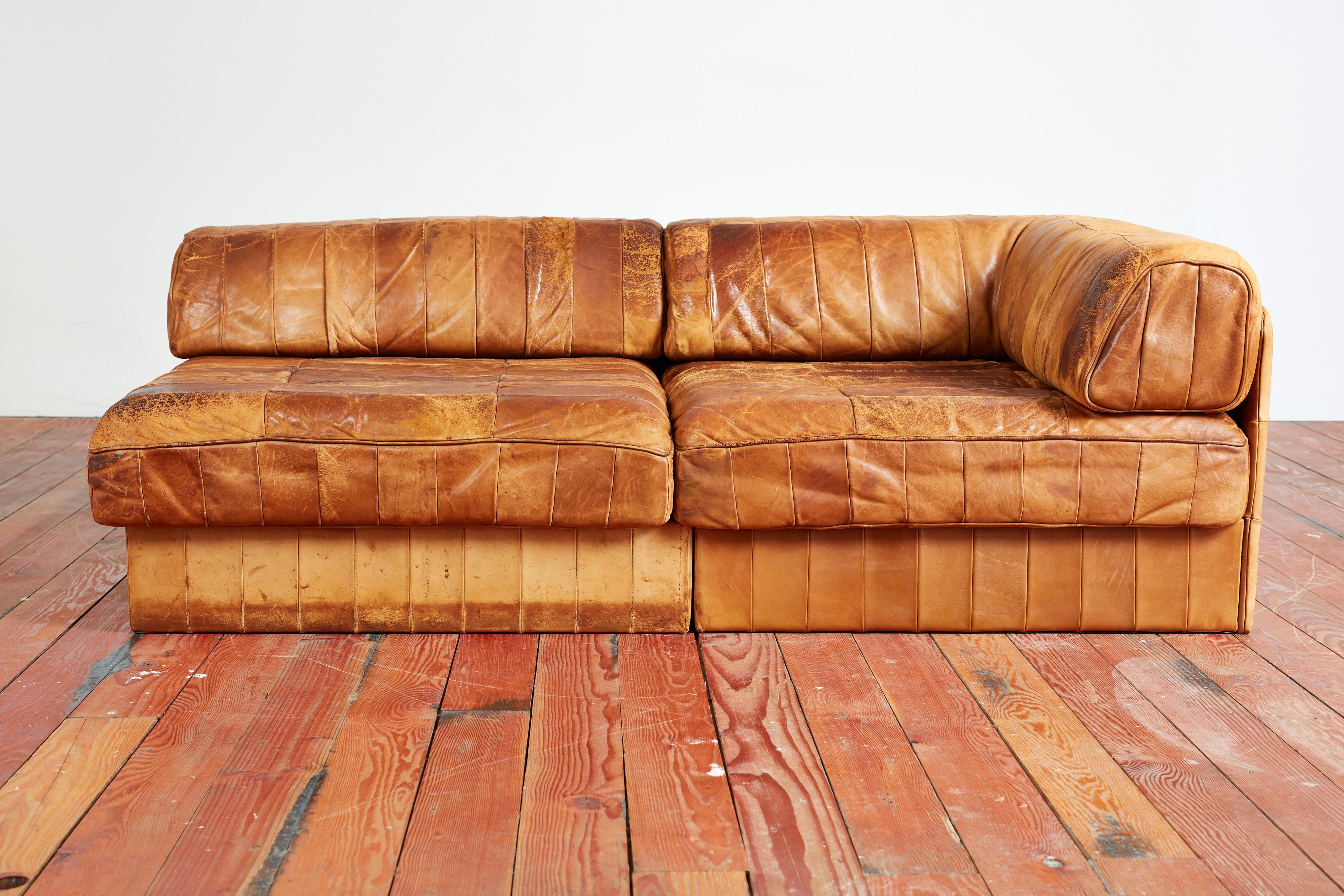 Patchwork leather modular sofa or chaise by De Sede
Switzerland, 1970's 
Beautiful patina to patchwork caramel leather. 
Matching pair of chairs sold separately - which could create a sectional. 

Measures: Height: 14.57 in. (37 cm)
Width: