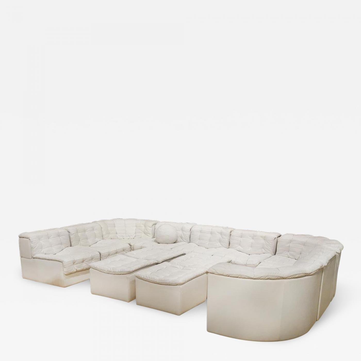 A Swiss modular sofa made by De Sede and distributed by Stendig model no. DS-11. The extensive sectional seating system is consists of 14 pieces that include 6 armless seats (21