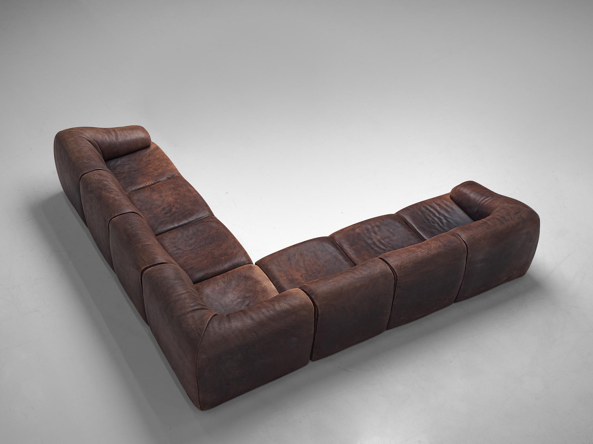 De Sede, lounge set, buffalo leather, Switzerland, circa 1970.

Comfortable lounge set designed and made by De Sede, Switzerland, 1970. The very comfortable sofa is upholstered in high quality brown buffalo leather, which has a beautiful patina.
