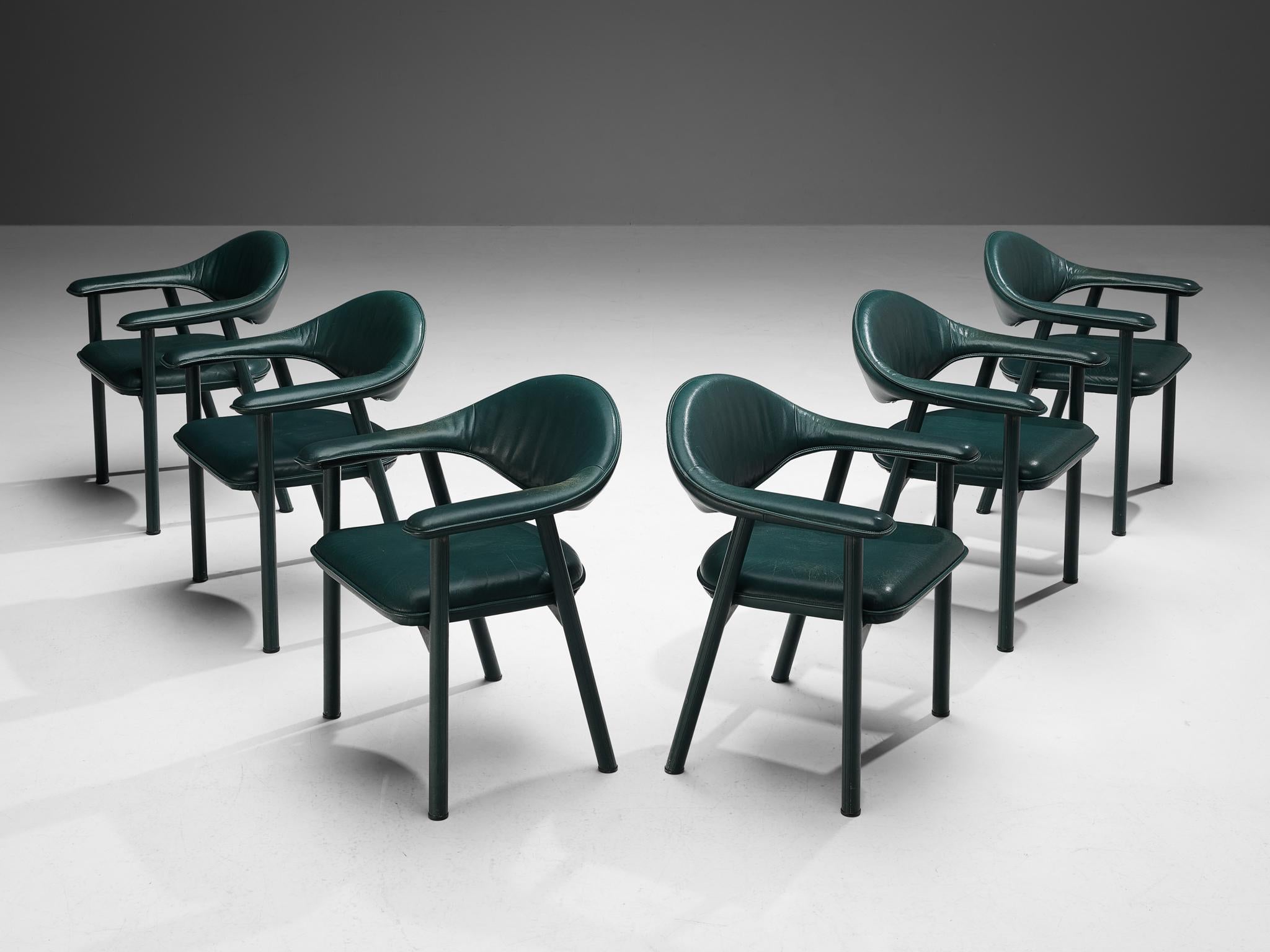 De Sede, set of six dining chairs, leather, Switzerland, 1980s

The design of these stunning armchairs features beautiful clear lines and round shapes. All the elements - backrest, seat, and legs - are executed in forest green leather, which