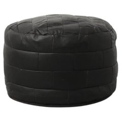 De Sede Style Round Black Patchwork Leather Ottoman