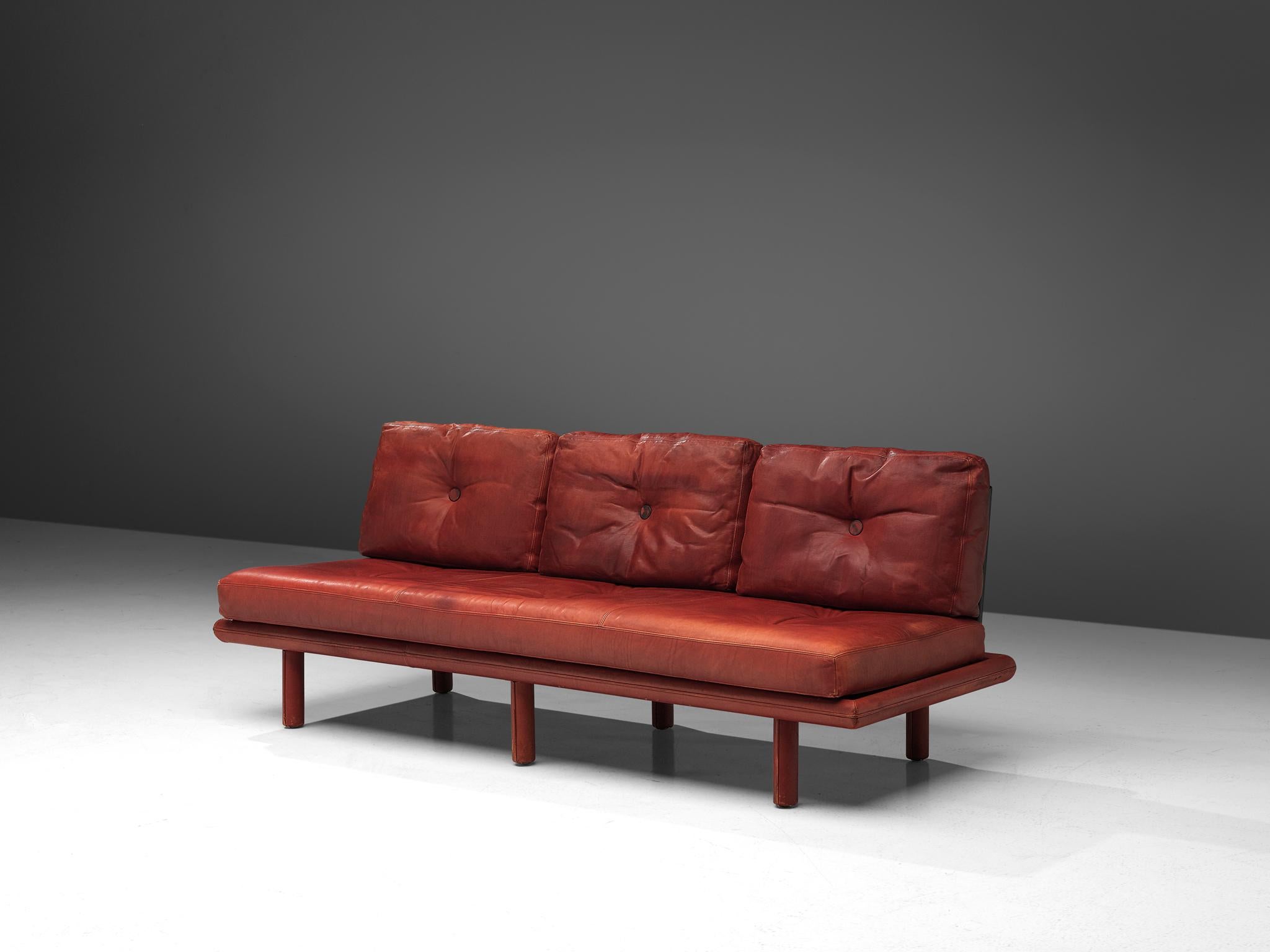 Franz Köttgen for Kill International, three-seat sofa, leather, Denmark, 1960s

Highly comfortable sofa in patinated red leather by Franz Köttgen. The design is simplistic, yet very modern. Leather is stitched and molded on to the frame and legs, a