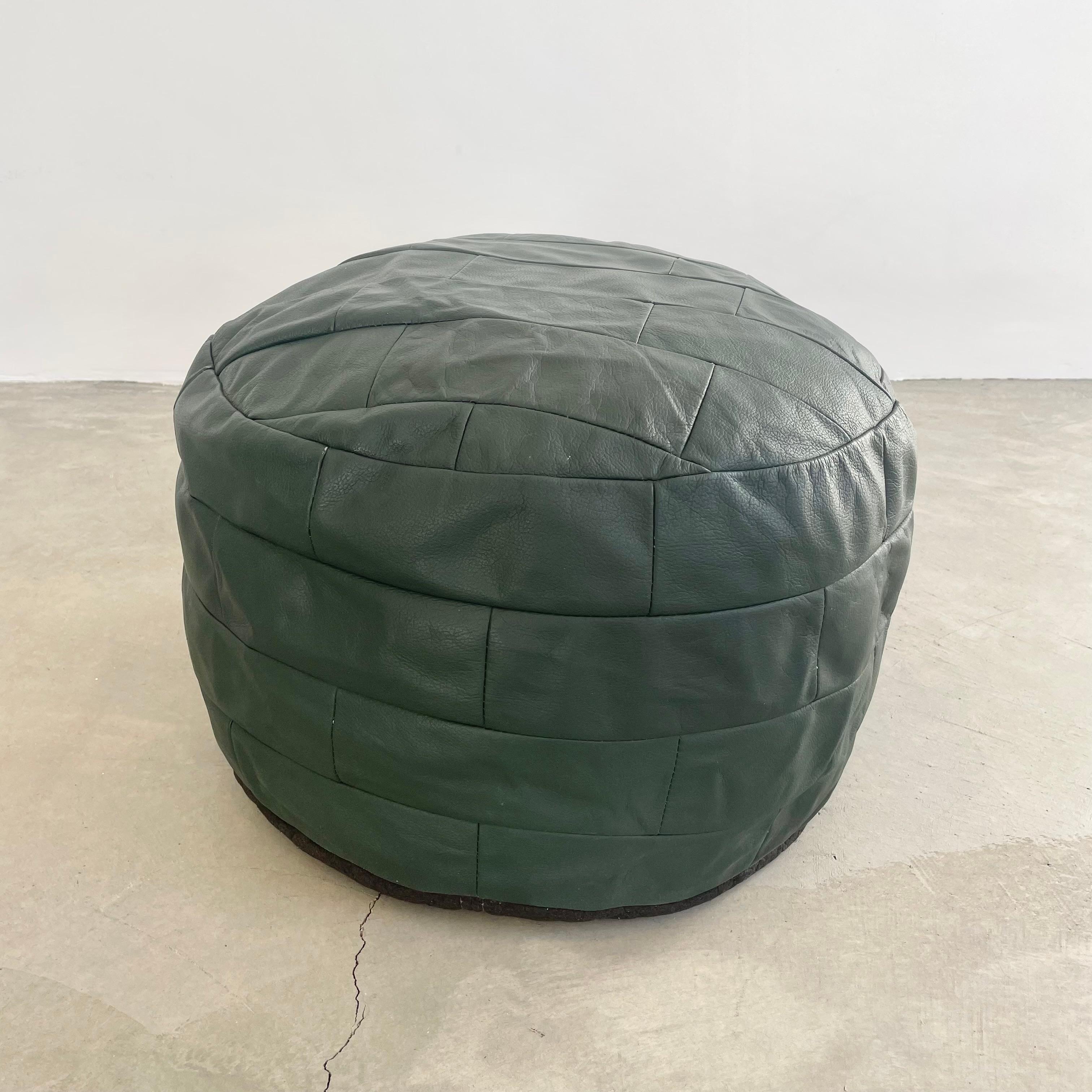 green leather pouf
