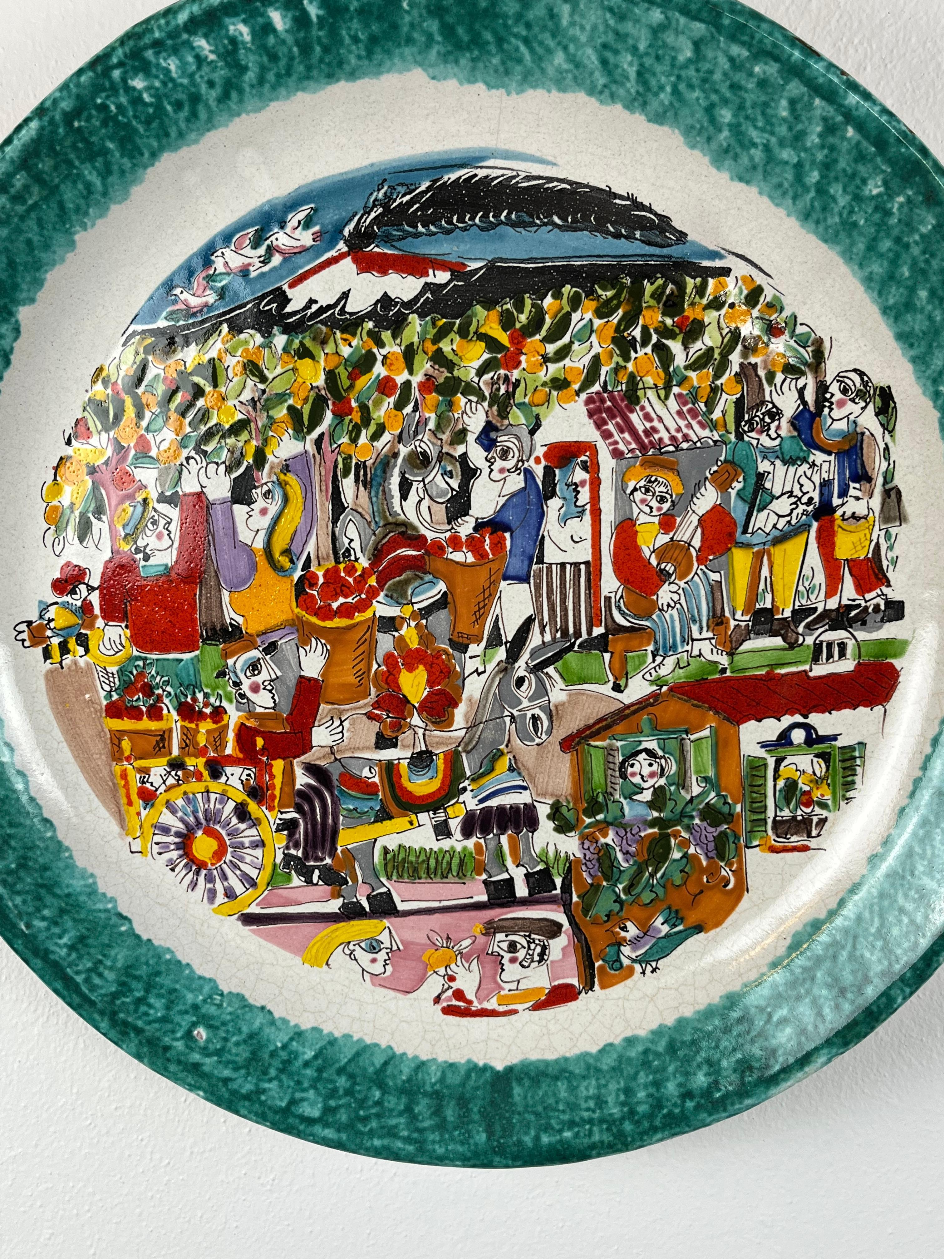 De Simone ceramic plate, Italy, 1970s, measure diameter 44 cm. The brand was born in the 1960s from the creative flair of the Palermo nobleman Giovanni De Simone and soon established itself in the panorama of Sicilian artistic ceramics thanks to a