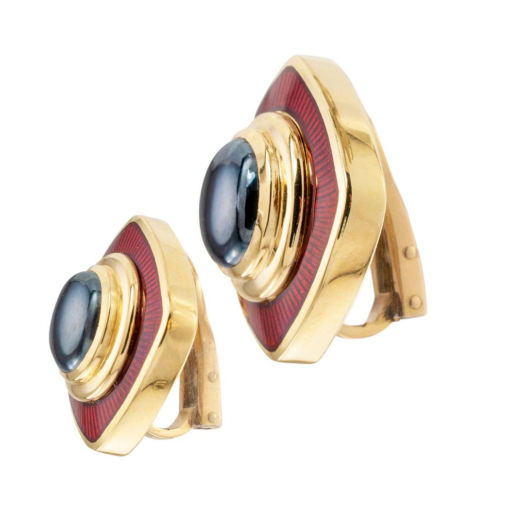 De Vroomen hematite red enamel and yellow gold clip earrings circa 1986.  Love them because they caught your eye, and we are here to connect you with beautiful and affordable jewelry.  It is time to claim a reward Yourself!  Simple and concise