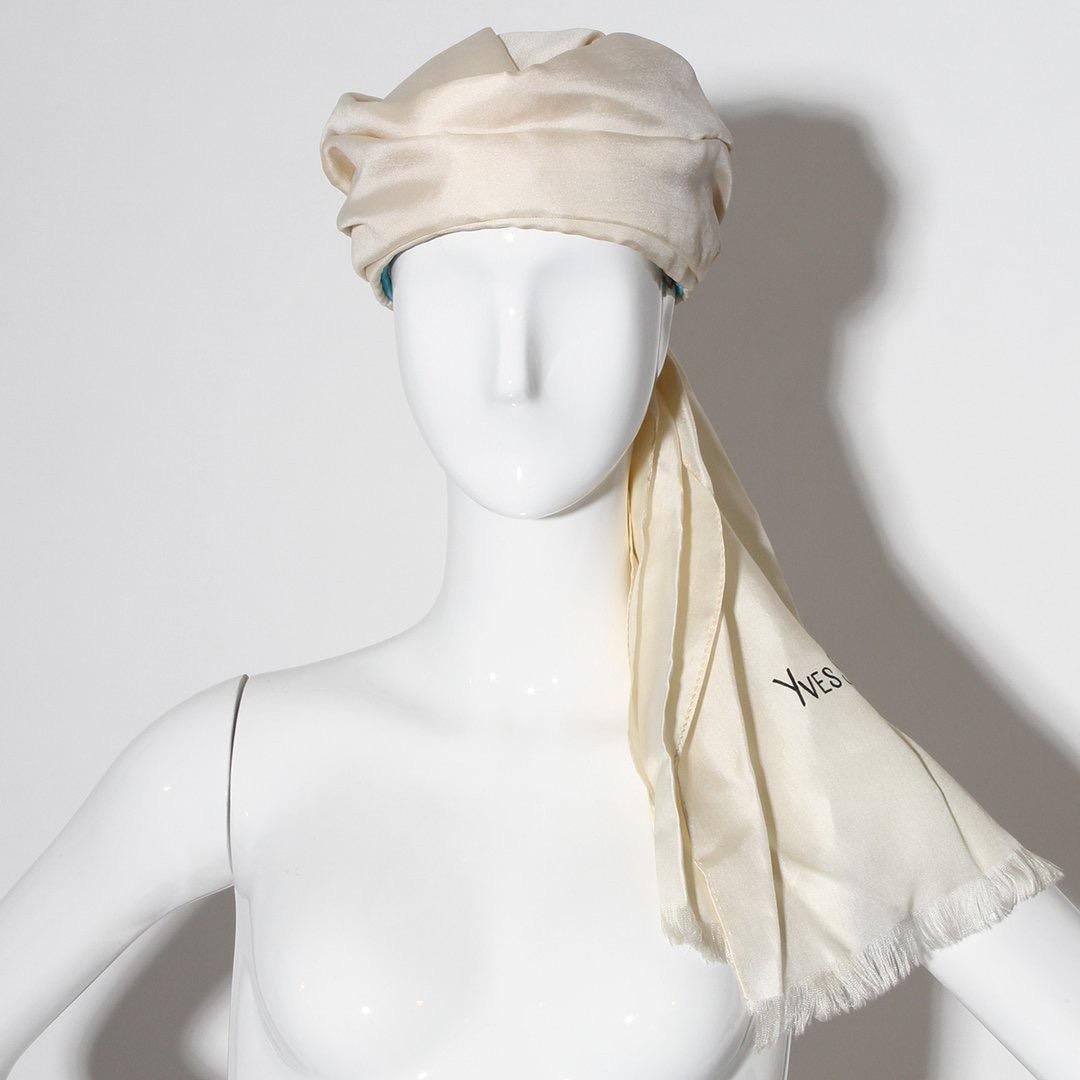 An extremely rare example of a headpiece from perhaps the most celebrated designer of the latter half of the 20th century: Yves Saint Laurent. This particular silk turban reflects the designer’s unique derivatives of inspiration that lay outside the