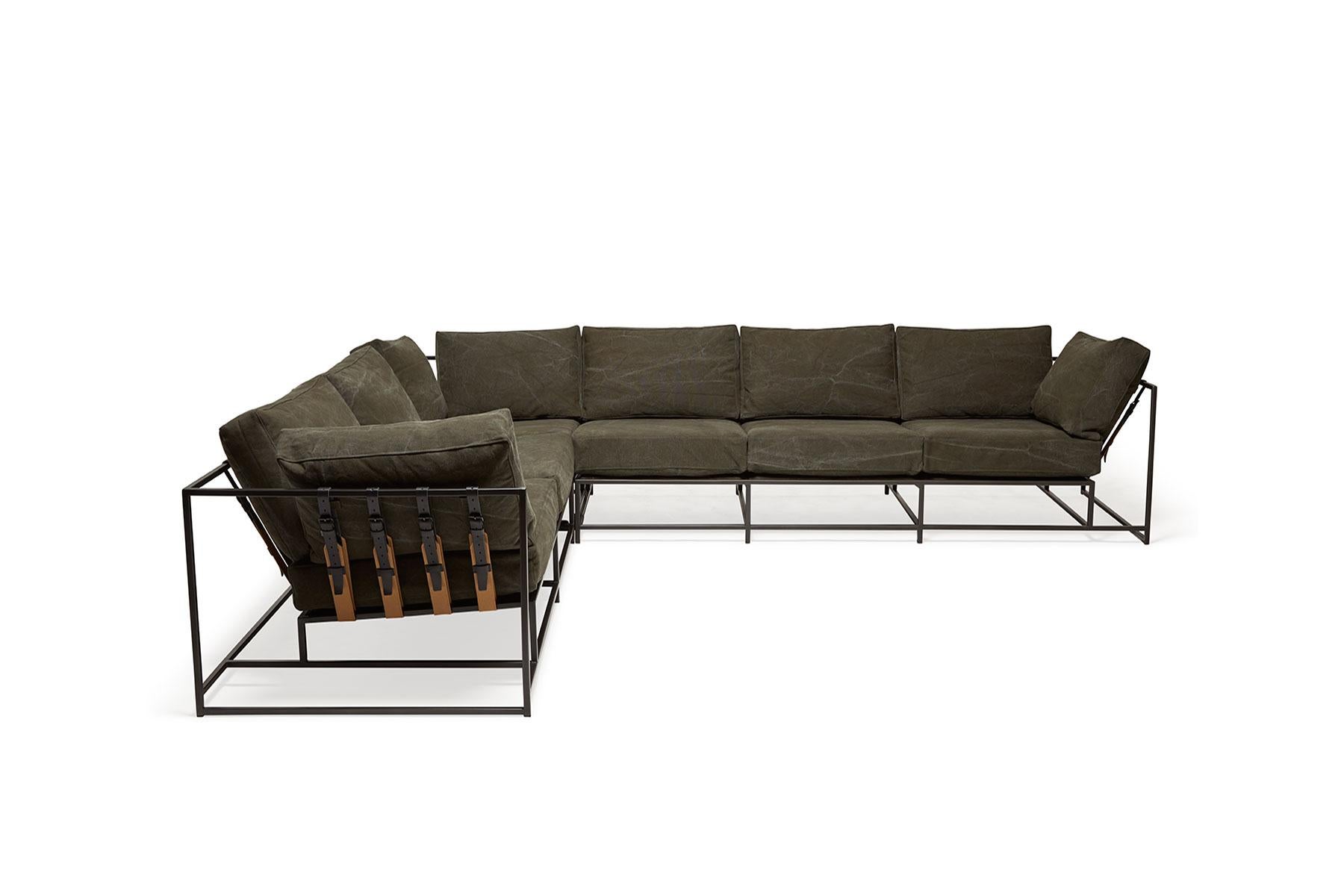 Stephen Kenn's Inheritance collection sectionals are a great way to customize your space and create the ultimate lounge environment.

This variation is upholstered in a heavyweight deadstock olive canvas which has been washed, resulting beautiful