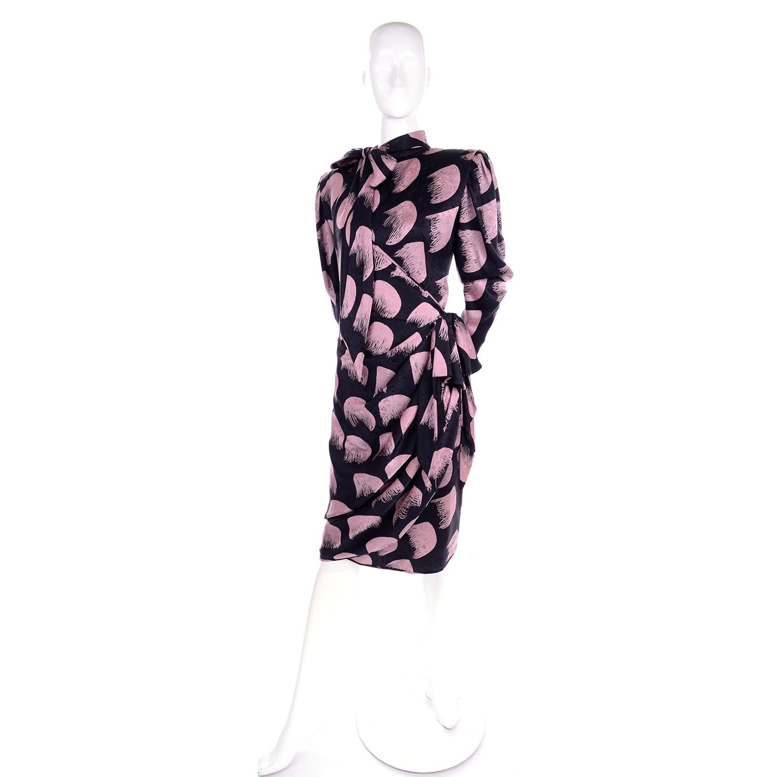 This is a lovely vintage dress from Emanuel Ungaro from the 1980's that is unworn with its original tag still attached.  This beautiful Ungaro Parallele wrap style dress was made in Italy and is beautifully draped and has shoulder pads, an attached