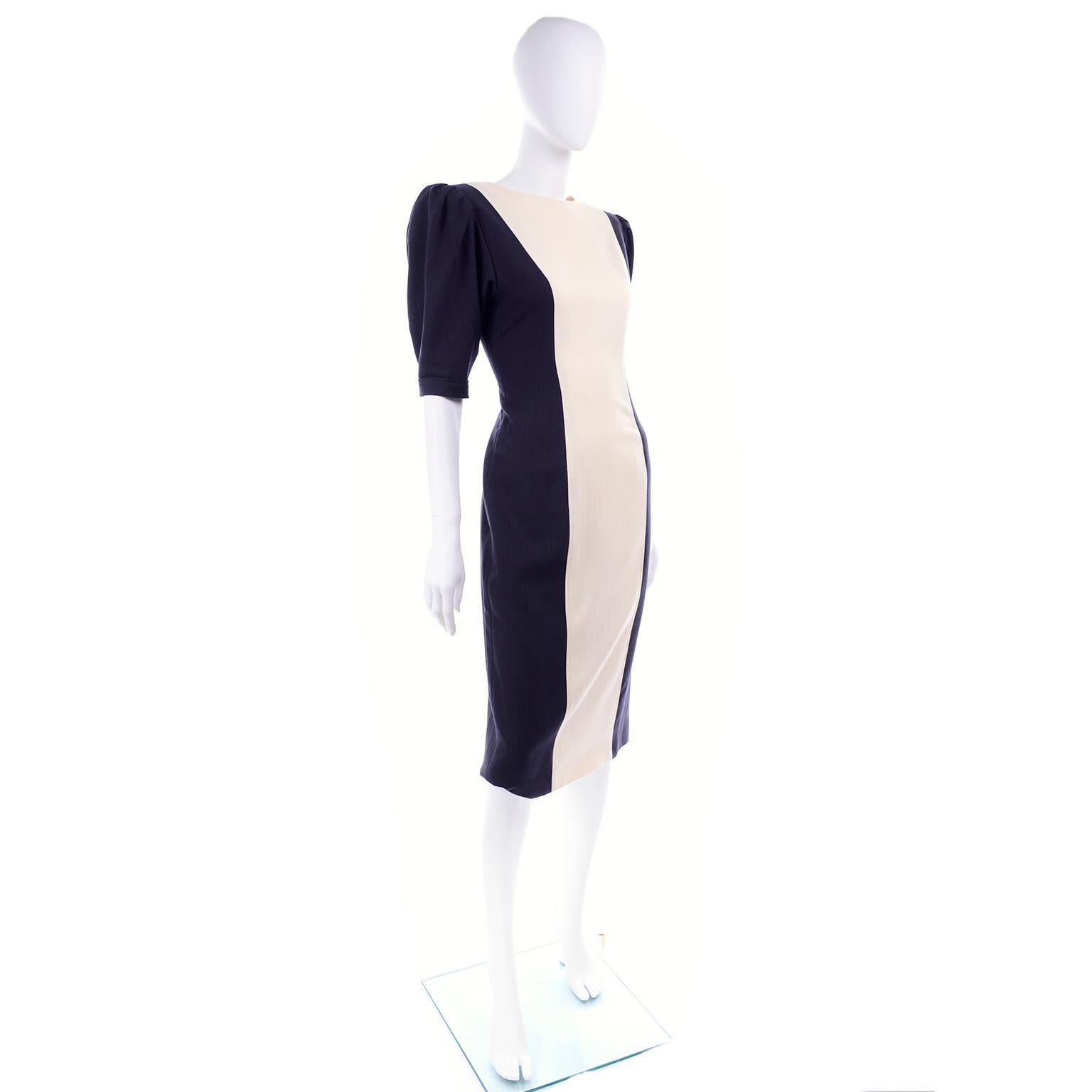 This is a vintage Navy and Cream textural striped Ungaro sheath dress with its original tags from I.Magnin from 1987. This vintage lightweight wool day dress has a jewel neckline, a gorgeous cut out in the back and sleeves that hit just above the