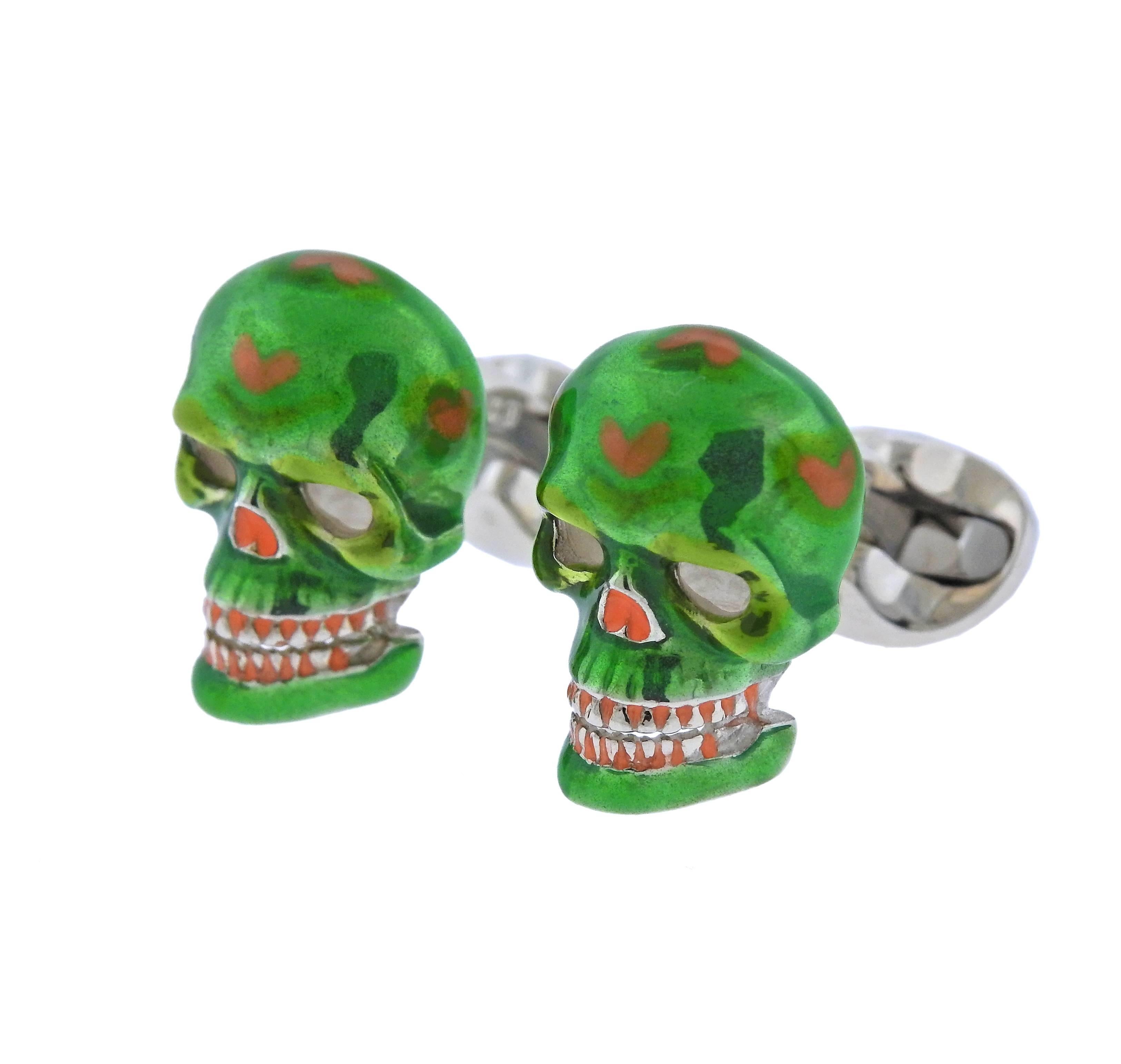 Brand new pair of sterling silver green enamel cufflinks, crafted by Deakin & Francis. Each skull measures 22mm x 16mm.  Marked: Deakin & Francis, D&F, 925, English mark. Weight - 22.8 grams.
Come with box and papers.