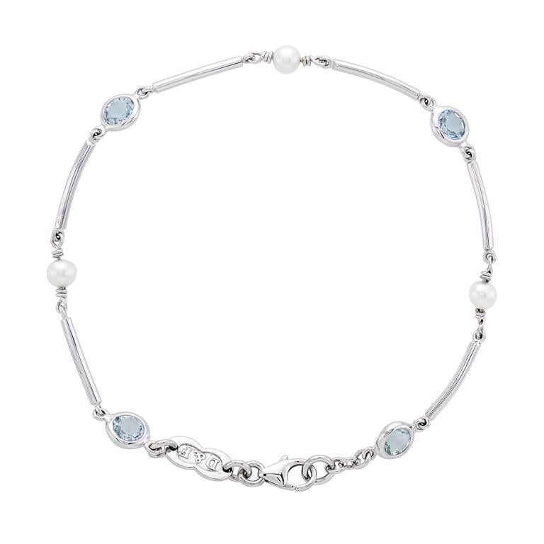 DEAKIN & FRANCIS, Piccadilly Arcade, London

Stylish, simple and sophisticated. This stunning 18ct white gold aquamarine and cultured pearl bracelet adds a classic touch to any outfit. Comprising of 3 cultured pearls and 4 round aquamarine