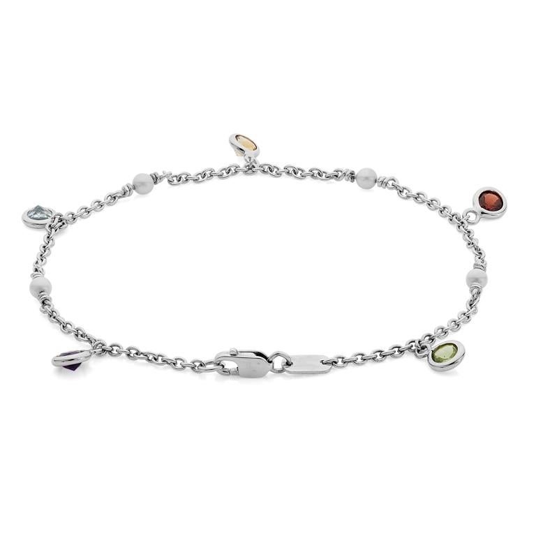 DEAKIN & FRANCIS, Piccadilly Arcade, London

This beautiful 18ct white gold multi gemstone and cultured pearl bracelet is a must have addition to any jewellery box. This bracelet comprises of four cultured pearls, one aquamarine, one amethyst, one