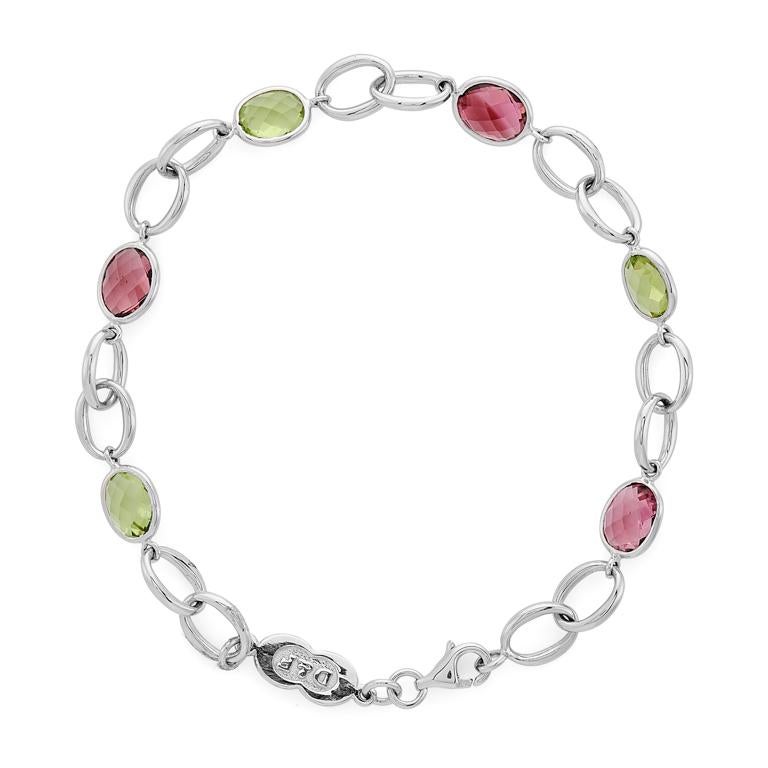 DEAKIN & FRANCIS, Piccadilly Arcade, London

A simple yet stunning bracelet is a must have accessory. This 18ct white gold pink tourmaline and peridot bracelet is the perfect finishing touch! Comprised of three peridot gemstones and three pink