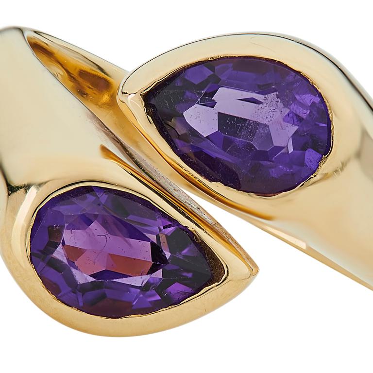 DEAKIN & FRANCIS, Piccadilly Arcade, London

Sophisticated, simple and stylish is the perfect way to describe this 18ct yellow gold amethyst ring. This rings simple design of over lapping pear shape amethyst gemstones gives it both a modern and