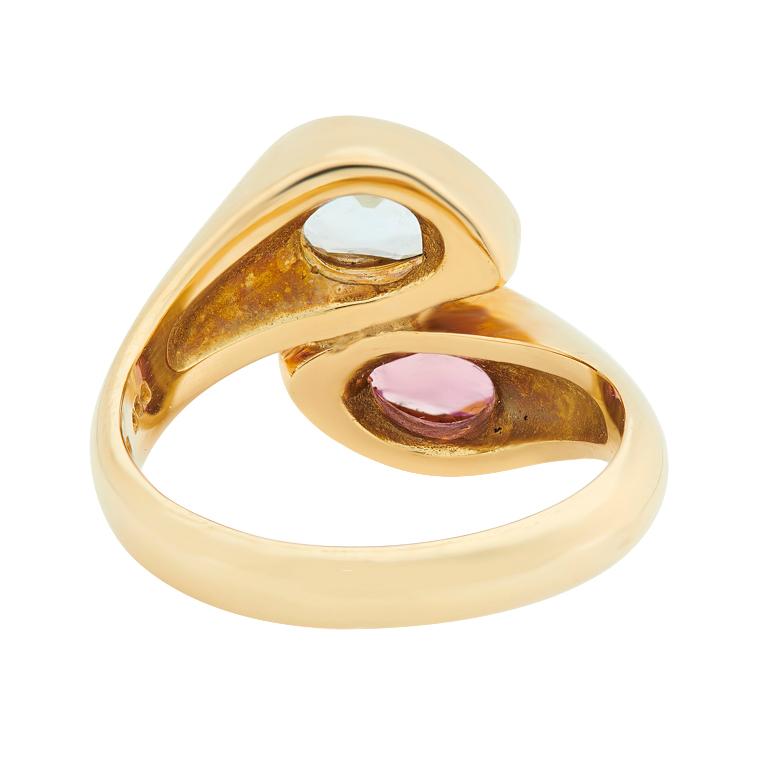DEAKIN & FRANCIS, Piccadilly Arcade, London

Sophisticated, simple and stylish is the perfect way to describe this 18ct yellow gold pink tourmaline and blue topaz ring. This rings simple design of over lapping pear shape gemstones gives it both a