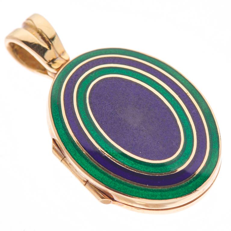DEAKIN & FRANCIS, Piccadilly Arcade, London

A must have addition to all jewellery boxes, lockets make the perfect family heirloom. This beautiful 18ct yellow gold locket has been vitreous enamelled in a navy blue and dark green. All of our enamel