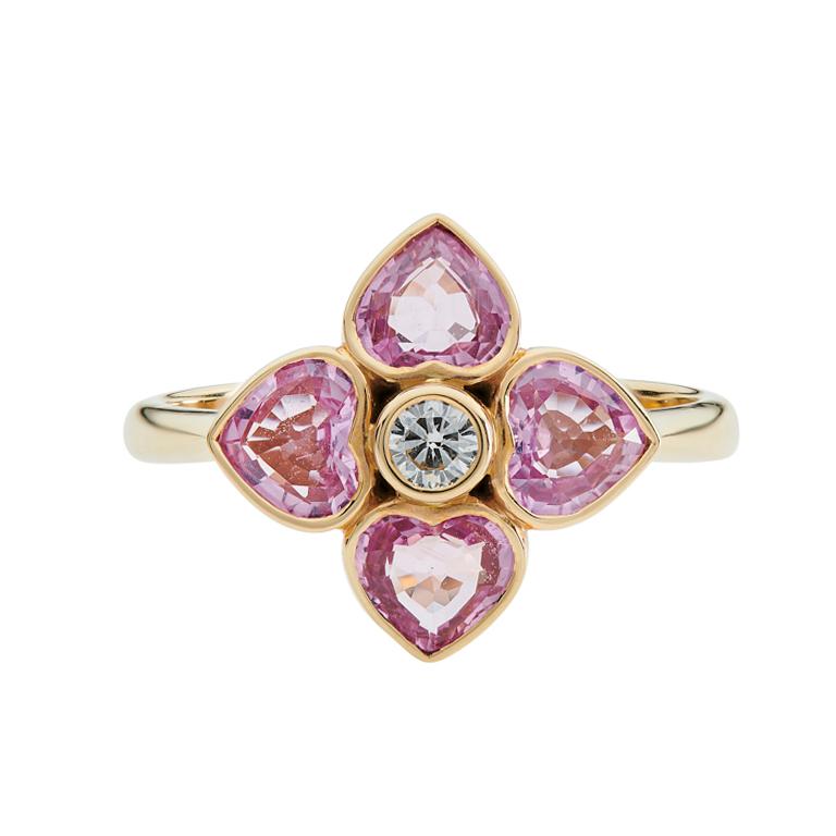 DEAKIN & FRANCIS, Piccadilly Arcade, London

Pretty in pink, this 18ct yellow gold pink sapphire and diamond cluster ring is a much needed addition to your jewellery box. Comprising of four heart shaped pink sapphires, with a small central brilliant
