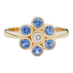 Anillo en racimo de zafiros y diamantes en oro amarillo de 18 quilates Deakin & Francis