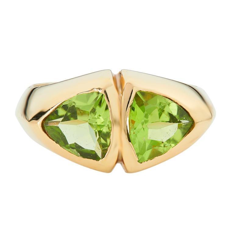 DEAKIN & FRANCIS, Piccadilly Arcade, London

This stunning 18ct yellow gold trillion cut peridot ring is the perfect way to celebrate the August birthstone. Comprising of two gorgeous green trillion cut peridot gemstones this ring is a wonderful one