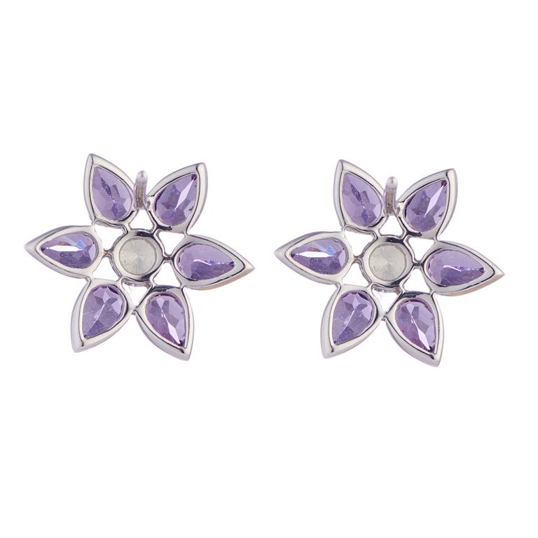 DEAKIN & FRANCIS, Piccadilly Arcade, London

These beautiful earrings are made from 18kt white gold with a central brilliant cut diamond and 6 pear shaped amethyst surround. These cluster earrings would make the perfect gift for those whose