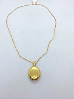 Deakin & Francis 18Kt Yellow Gold & Blue Enamel Oval Locket with Diamond Center