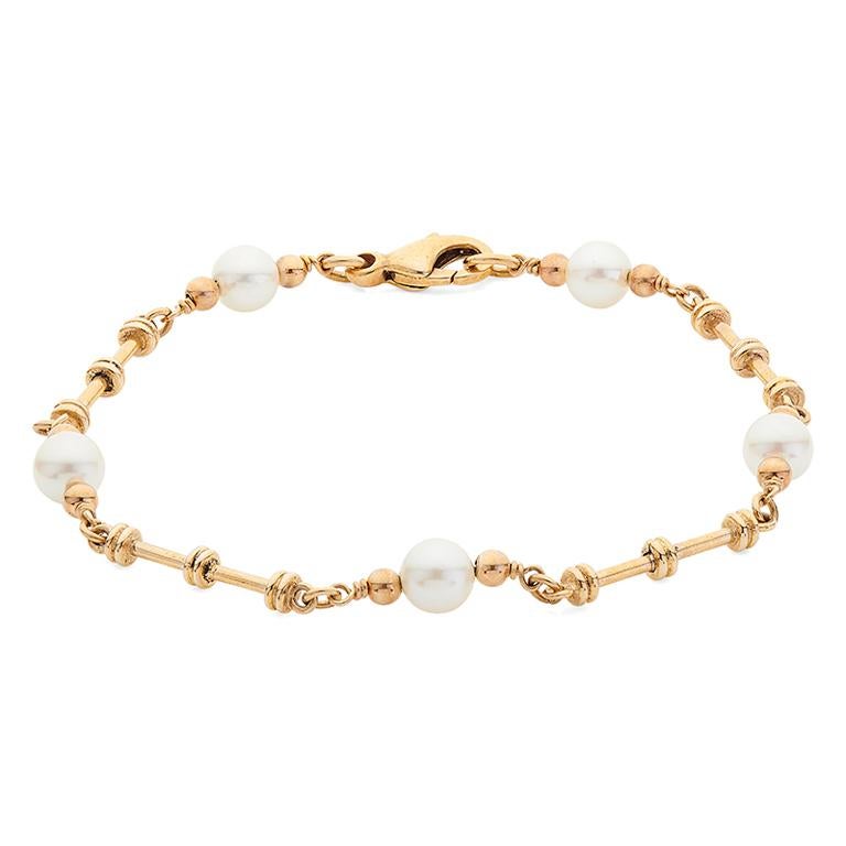 DEAKIN & FRANCIS, Piccadilly Arcade, London

This wonderful 9ct gold bracelet features five cultured pearls separated by 9ct gold dumbbell links. The perfect addition to any jewellery box this bracelet adds an elegant and classic touch to any