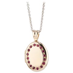 Deakin & Francis 9 Karat Yellow Gold Ruby Set Locket