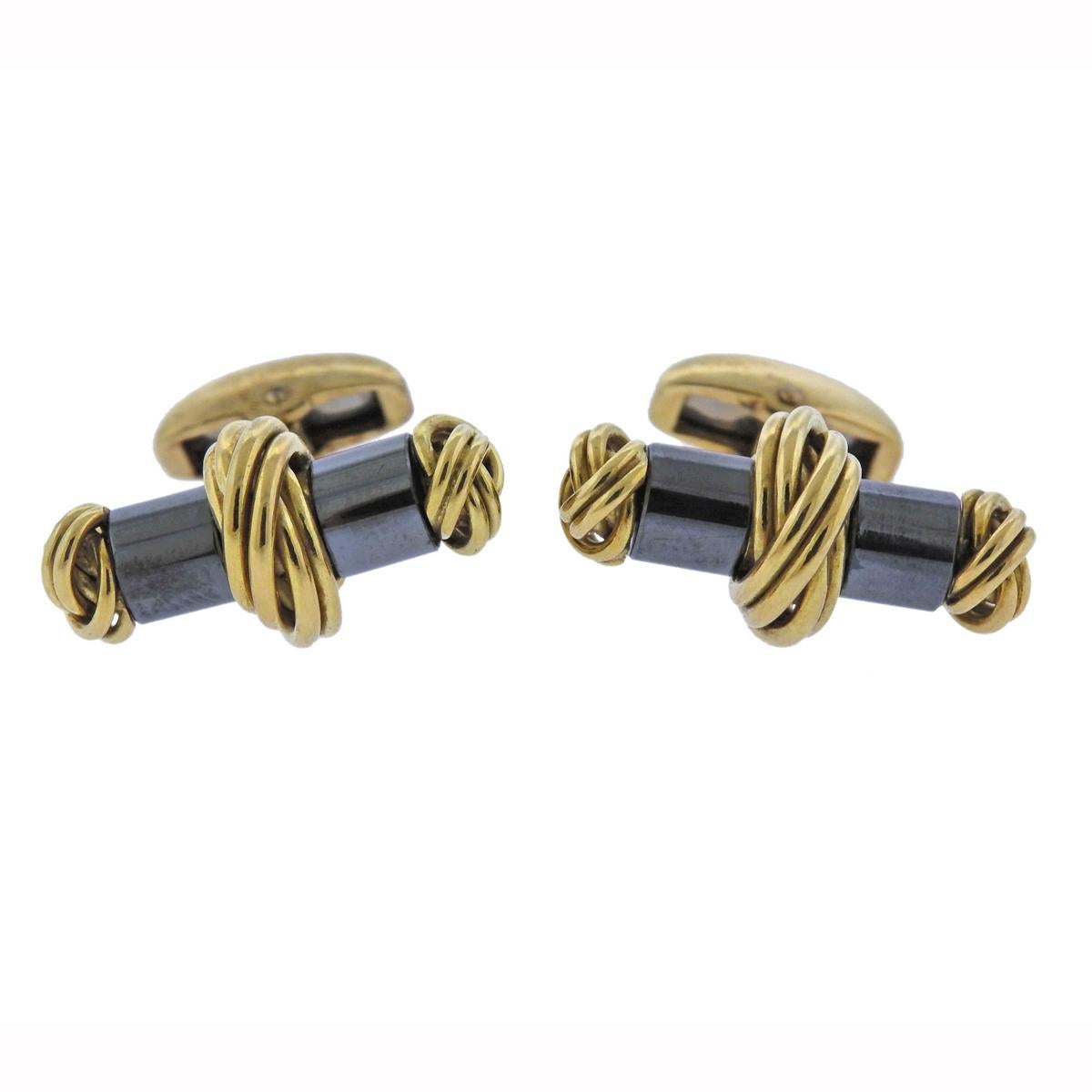 Pair of classic 18k yellow gold and hematite cufflinks, crafted by Deakin & Francis.  Cufflink top measures 23mm x 12mm, weigh 23.1 grams. Marked: D & F, English gold assay marks.
