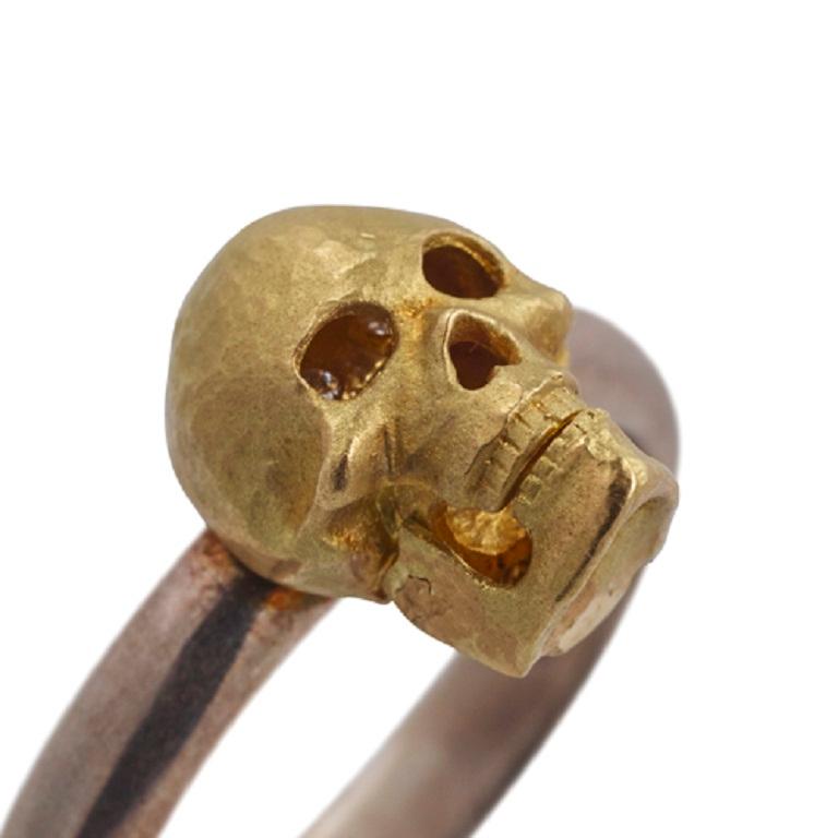 DEAKIN & FRANCIS, Piccadilly Arcade, London

Our trademark skulls really are a statement! The skull made from 18kt yellow gold and has our unique jaw drop feature to reveal dazzling diamond eyes. Mounted onto a silver band. This ring is the only one