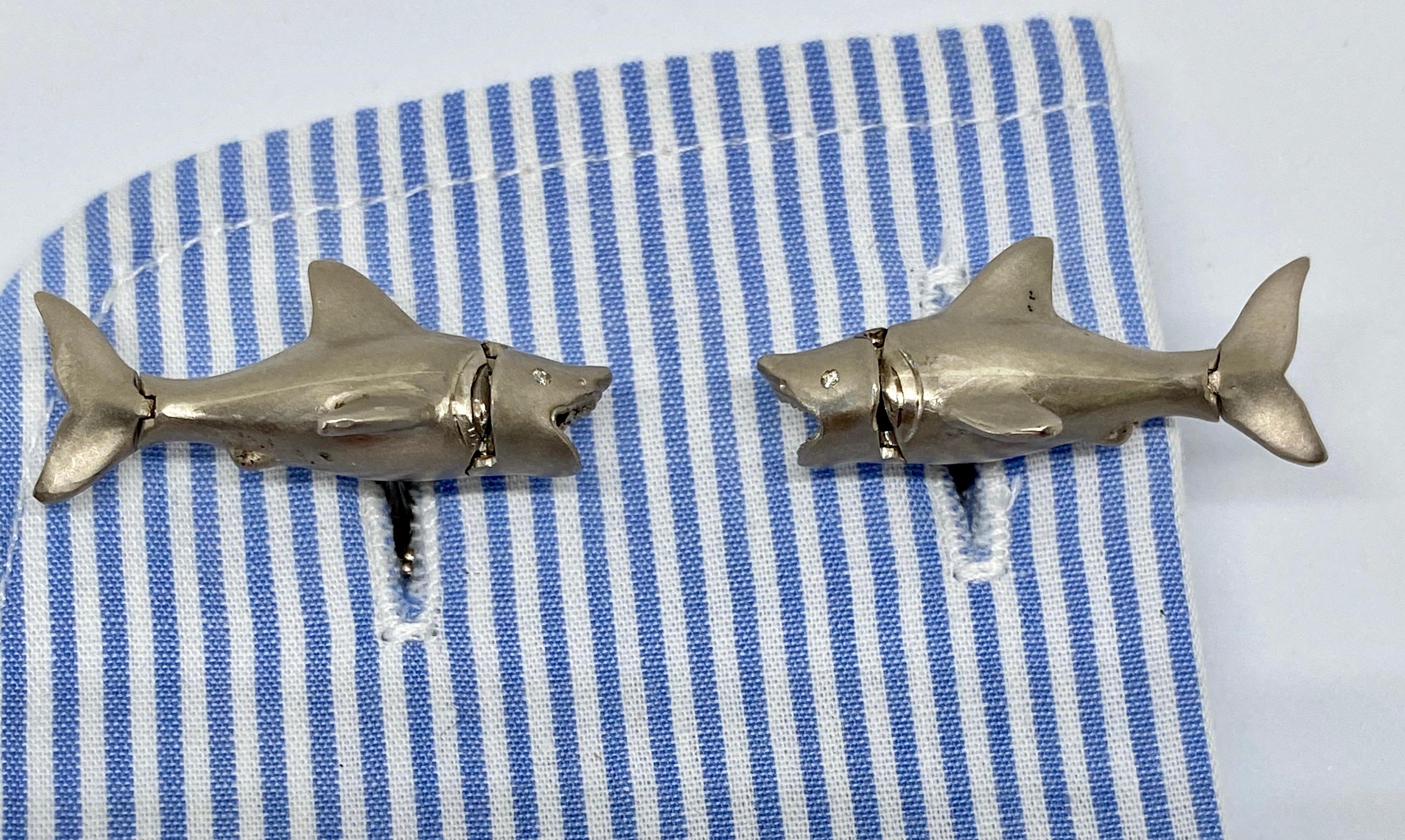 For days when you're swimming with sharks, these brilliant cufflinks feature a beautifully designed shark with a moveable head and tail, backed with a surfboard with a chunk bitten out of it.

Rendered in a very substantial 25.87 grams of solid,