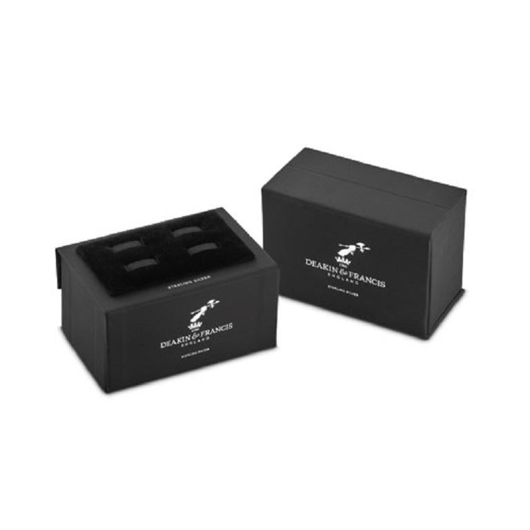 DEAKIN & FRANCIS, Piccadilly Arcade, London

This classic yet contemporary pair of sterling silver dumbbell cufflinks feature black onyx inlay ends. This unique step dumbbell design adds a modern and fun edge to these classic looking cufflinks.