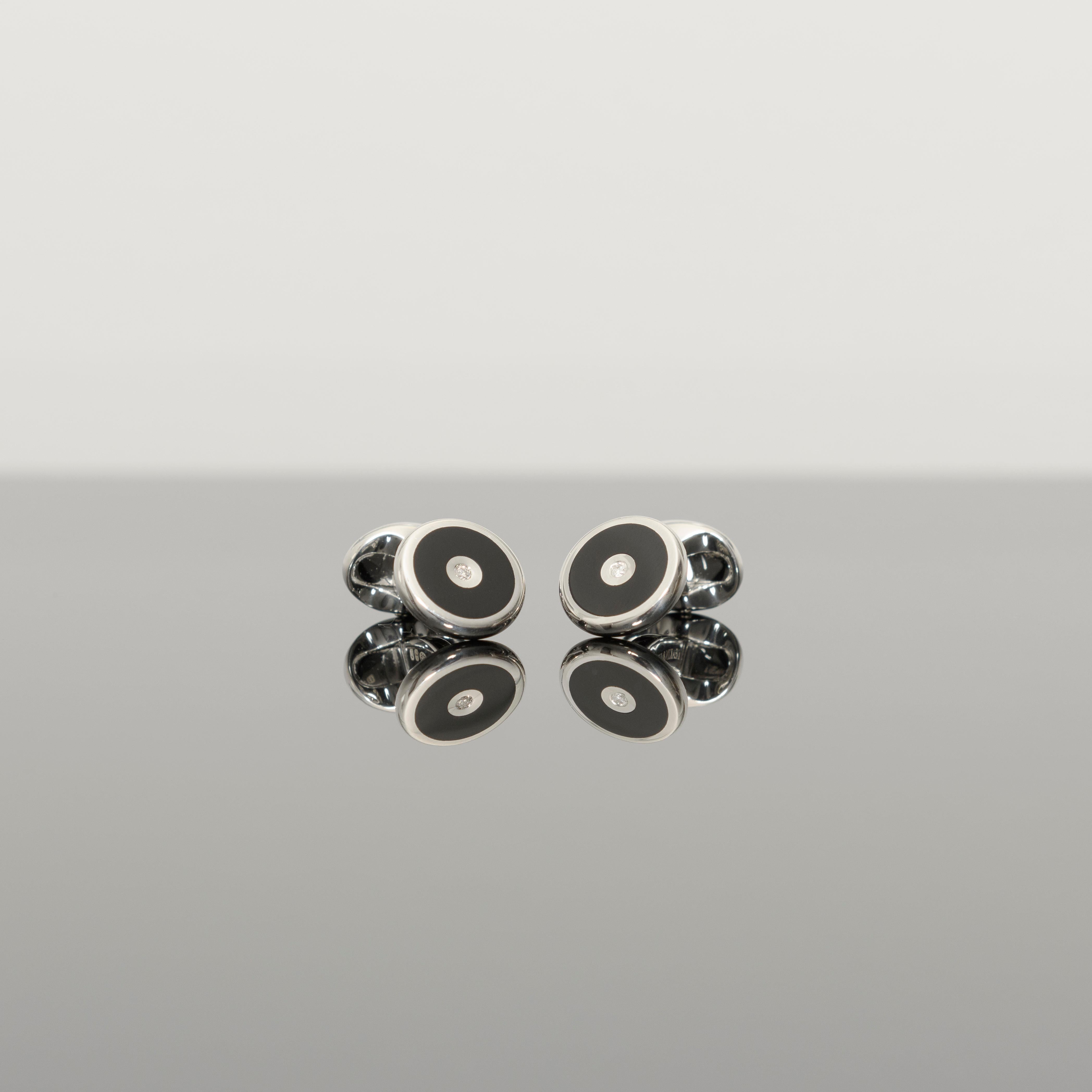 DEAKIN & FRANCIS, Piccadilly Arcade, London

For well dressed gentlemen, a pair of classic round cufflinks are ideal. These sterling silver cufflinks have been given a contemporary twist with a hand-cut black onyx inlay and finished with a stunning