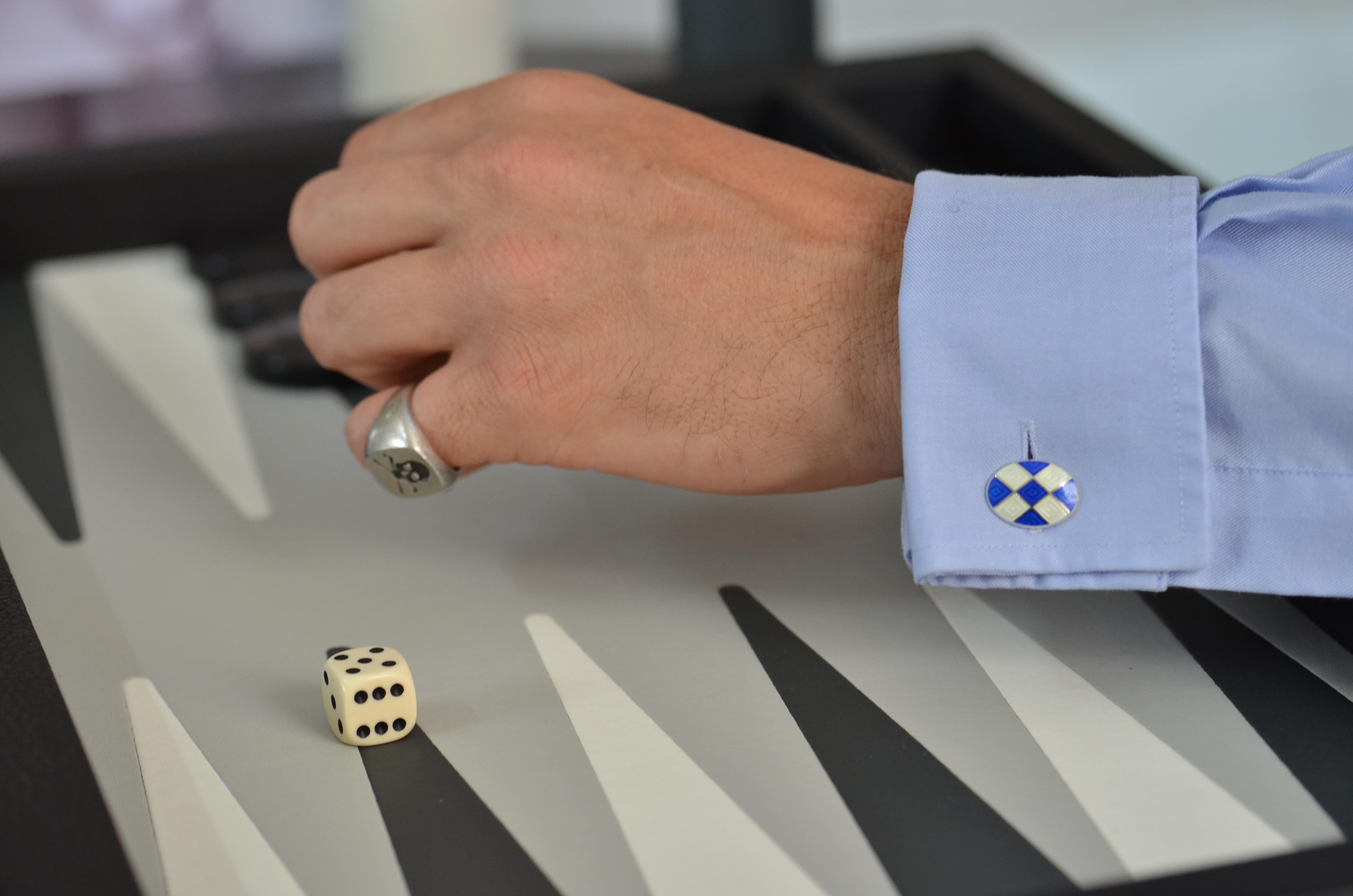 DEAKIN & FRANCIS, Piccadilly Arcade, London

Here at Deakin & Francis we are masters in the art of vitreous enamelling, dating back to the Pharaohs, this is a highly specialised, hand skill.

These sterling silver, oval cufflinks are classic with a