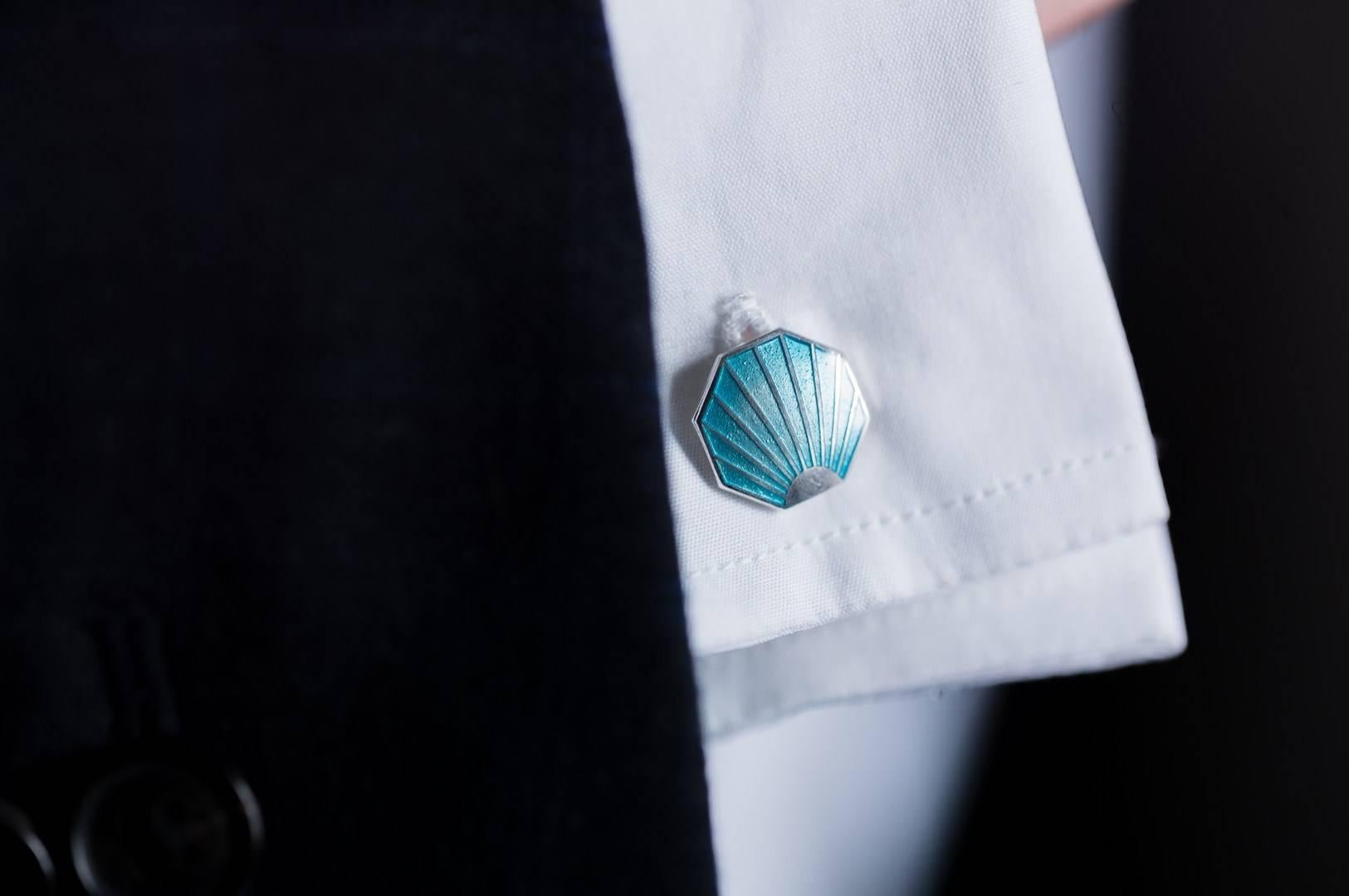 BERNARDO ANTICHITÀ PONTE VECCHIO FLORENCE

Made from sterling silver, these unique shell design cufflinks have a stunning hand-painted, turquoise blue hand-enamel finish.
With a nod to the vintage, these designs can be traced back to the 1900's and