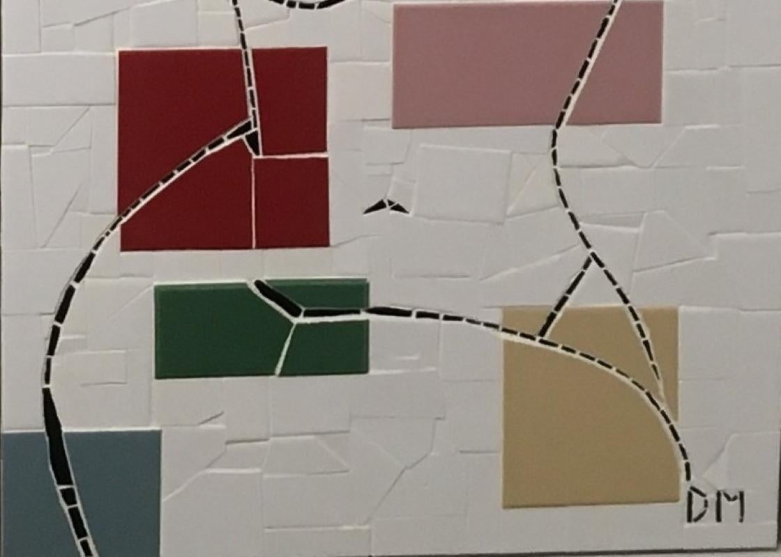 Figura fragmentada, de Dean Moore, está creada con mosaicos de azulejos cortados a mano.  Técnica mixta, 32 x 24, enmarcado.   Se trata de una figura femenina con una serie de azulejos de colores.  Es una nueva obra de arte de 2025.

Decano  Moore
