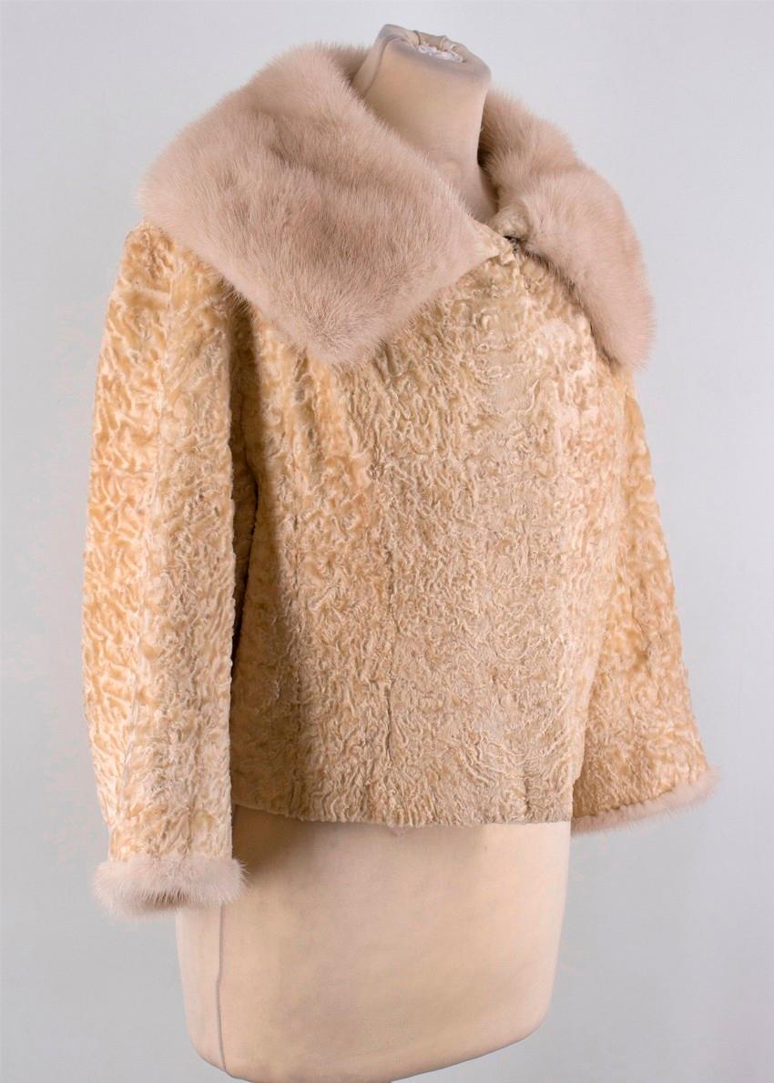Deanfield Bespoke Astrakhan Cropped Jacket with Mink Fur Collar

- Cropped Astrakhan shearling body
- Mink Fur Collar and Cuffs
- Fully Lined
- Button and hook and eye closure

Approx.
Measurements are taken laying flat, seam to seam. 

Length -